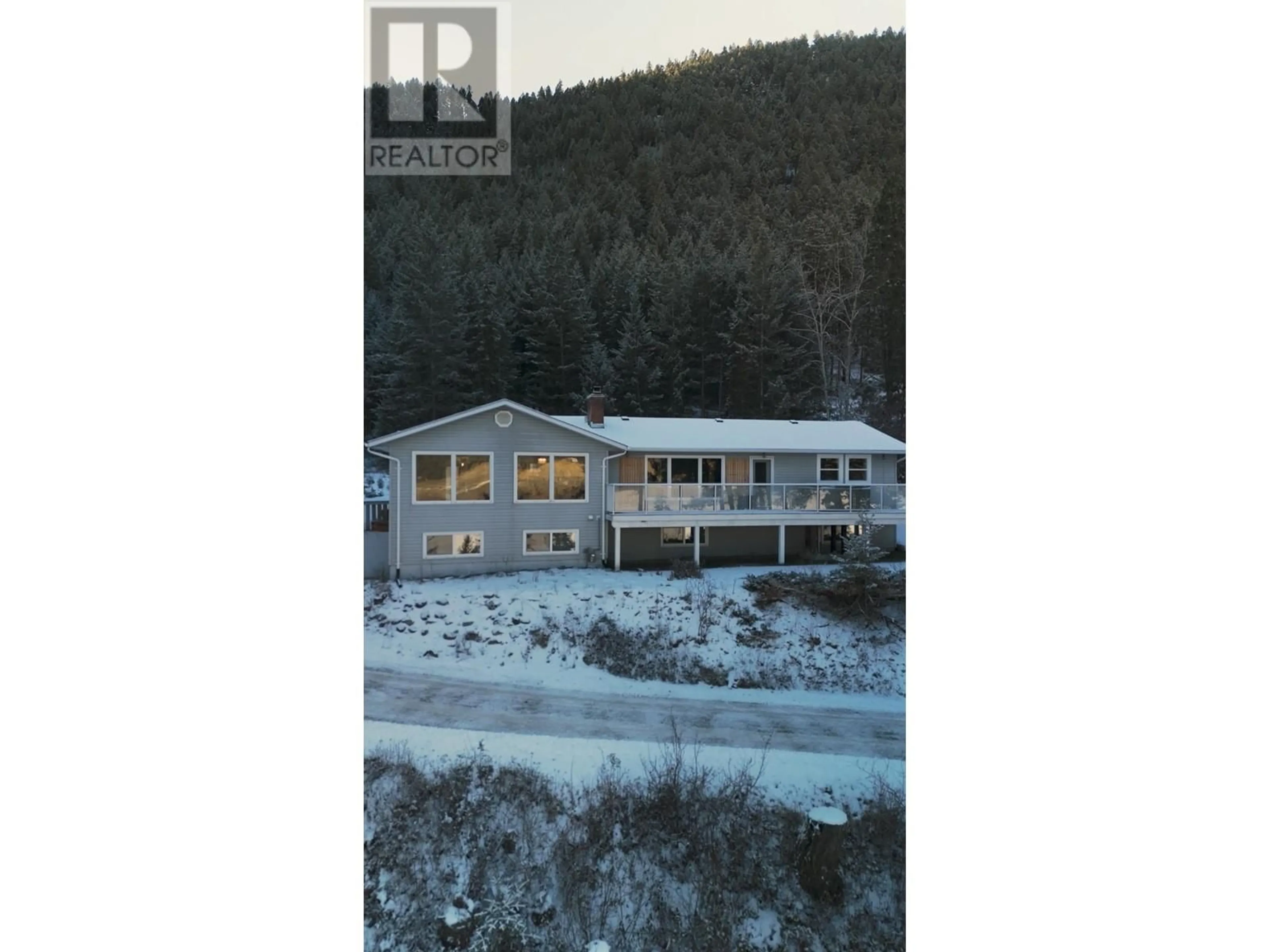 A pic from outside/outdoor area/front of a property/back of a property/a pic from drone, water/lake/river/ocean view for 1929 SOUTH LAKESIDE DRIVE, Williams Lake British Columbia V2G5G1