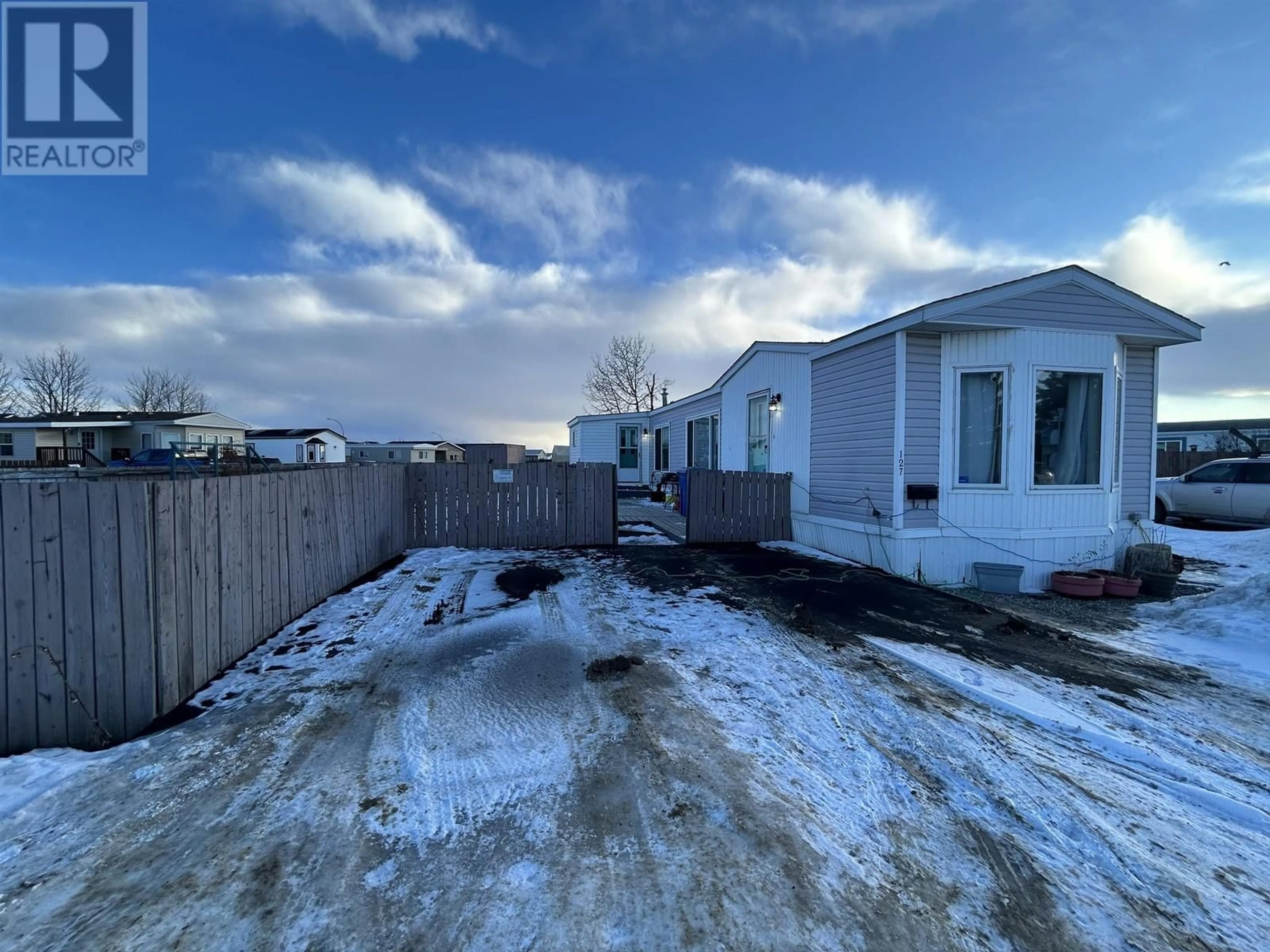 A pic from outside/outdoor area/front of a property/back of a property/a pic from drone, unknown for 127 8420 ALASKA ROAD, Fort St. John British Columbia V1J4J6