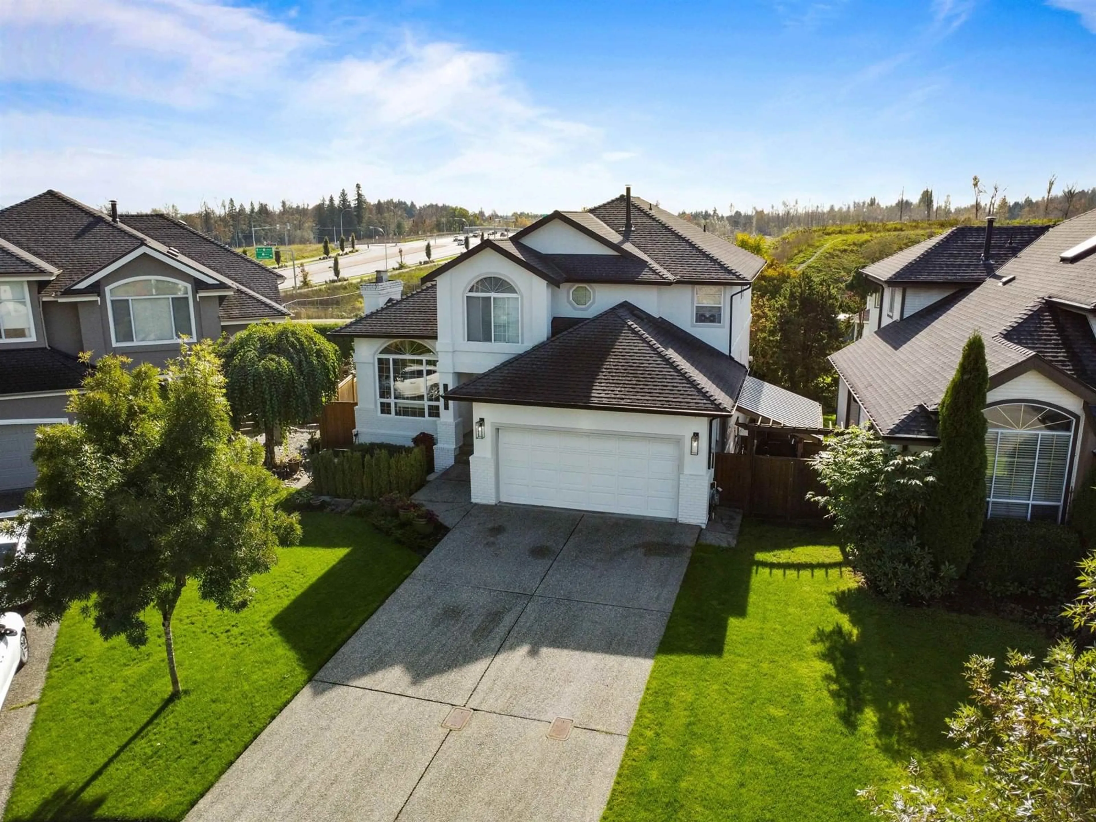 A pic from outside/outdoor area/front of a property/back of a property/a pic from drone, street for 21560 84 AVENUE, Langley British Columbia V1M2M1