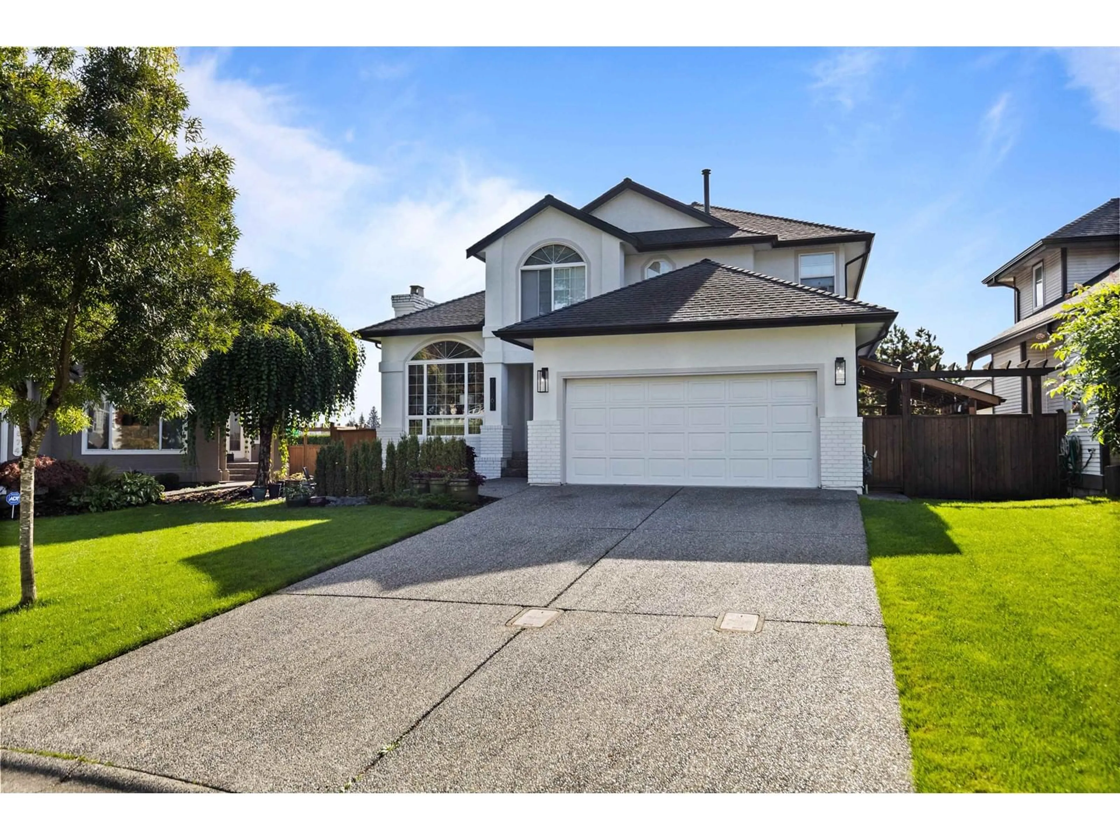 Home with vinyl exterior material, street for 21560 84 AVENUE, Langley British Columbia V1M2M1