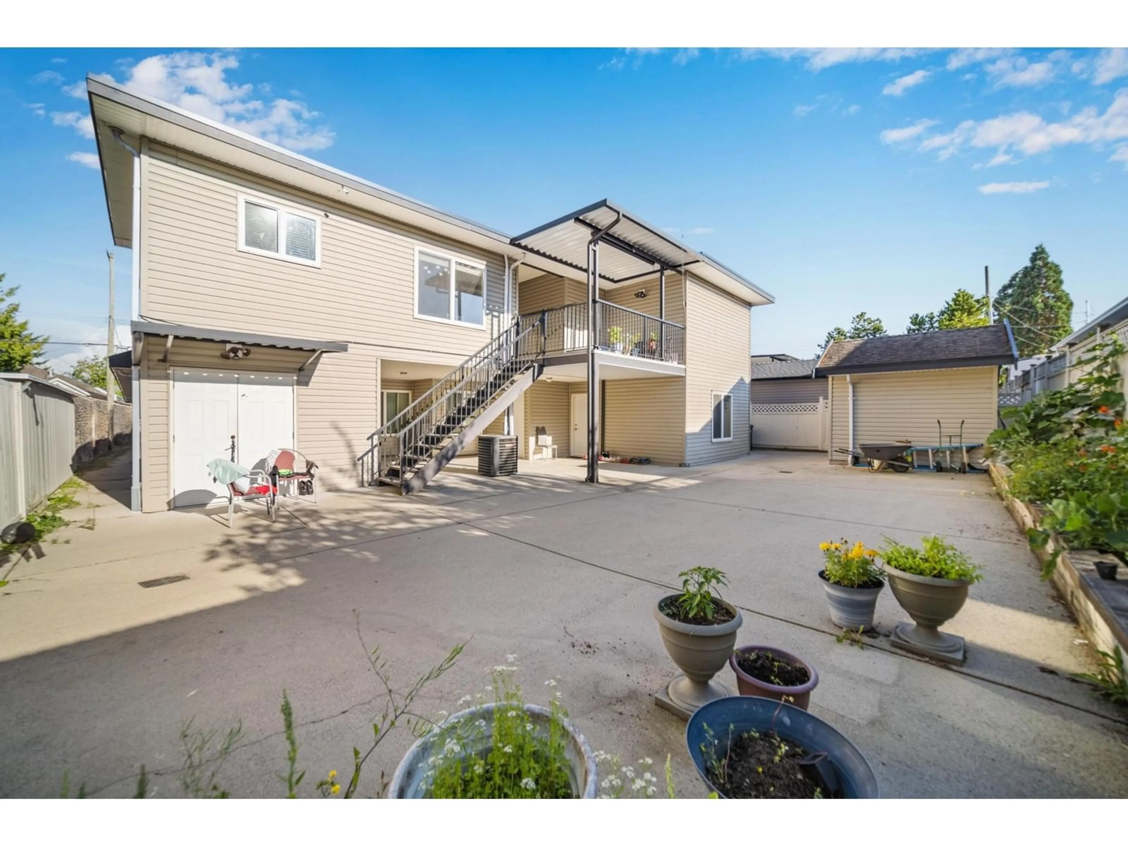 A pic from outside/outdoor area/front of a property/back of a property/a pic from drone, street for 7819 127 STREET, Surrey British Columbia V3W4B2