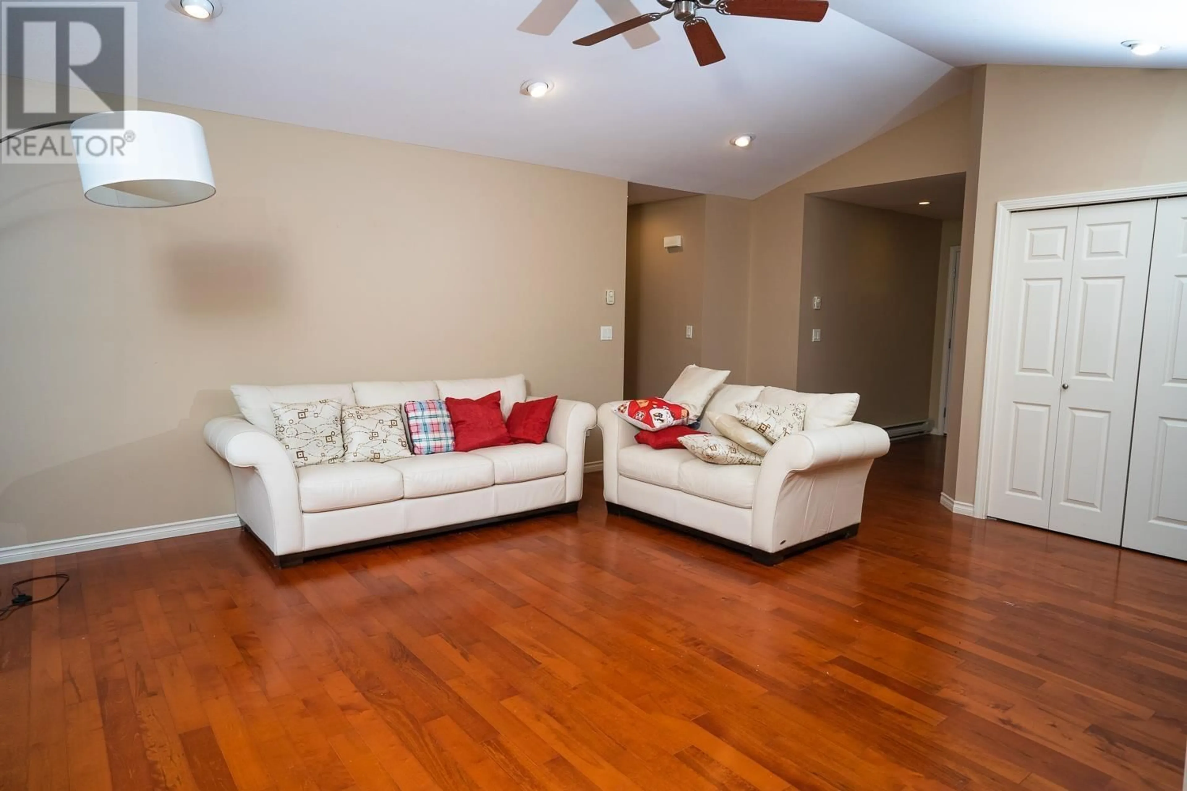 Living room with furniture, wood/laminate floor for 5886 SANDY HOOK ROAD, Sechelt British Columbia V7Z0P4