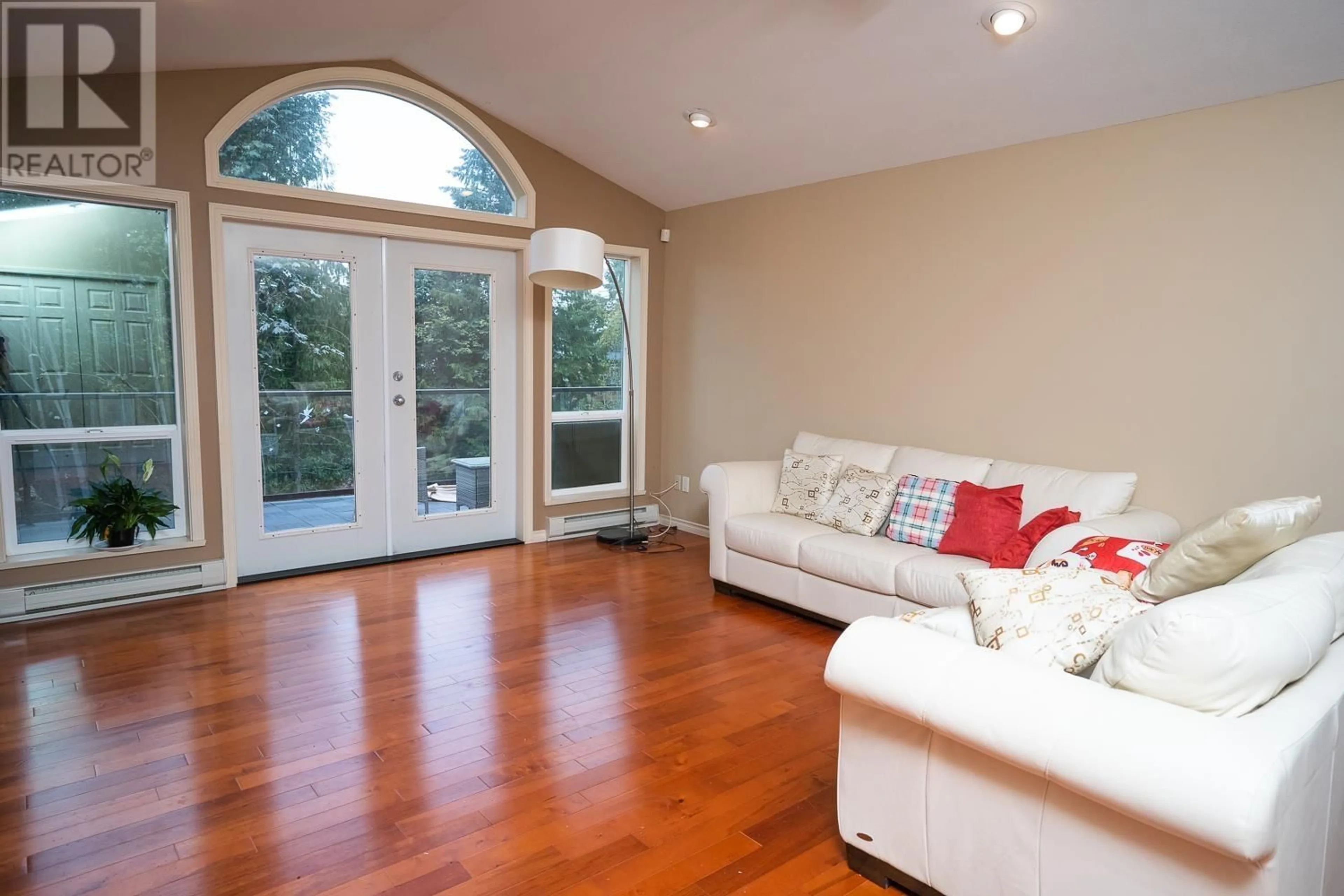 Living room with furniture, wood/laminate floor for 5886 SANDY HOOK ROAD, Sechelt British Columbia V7Z0P4