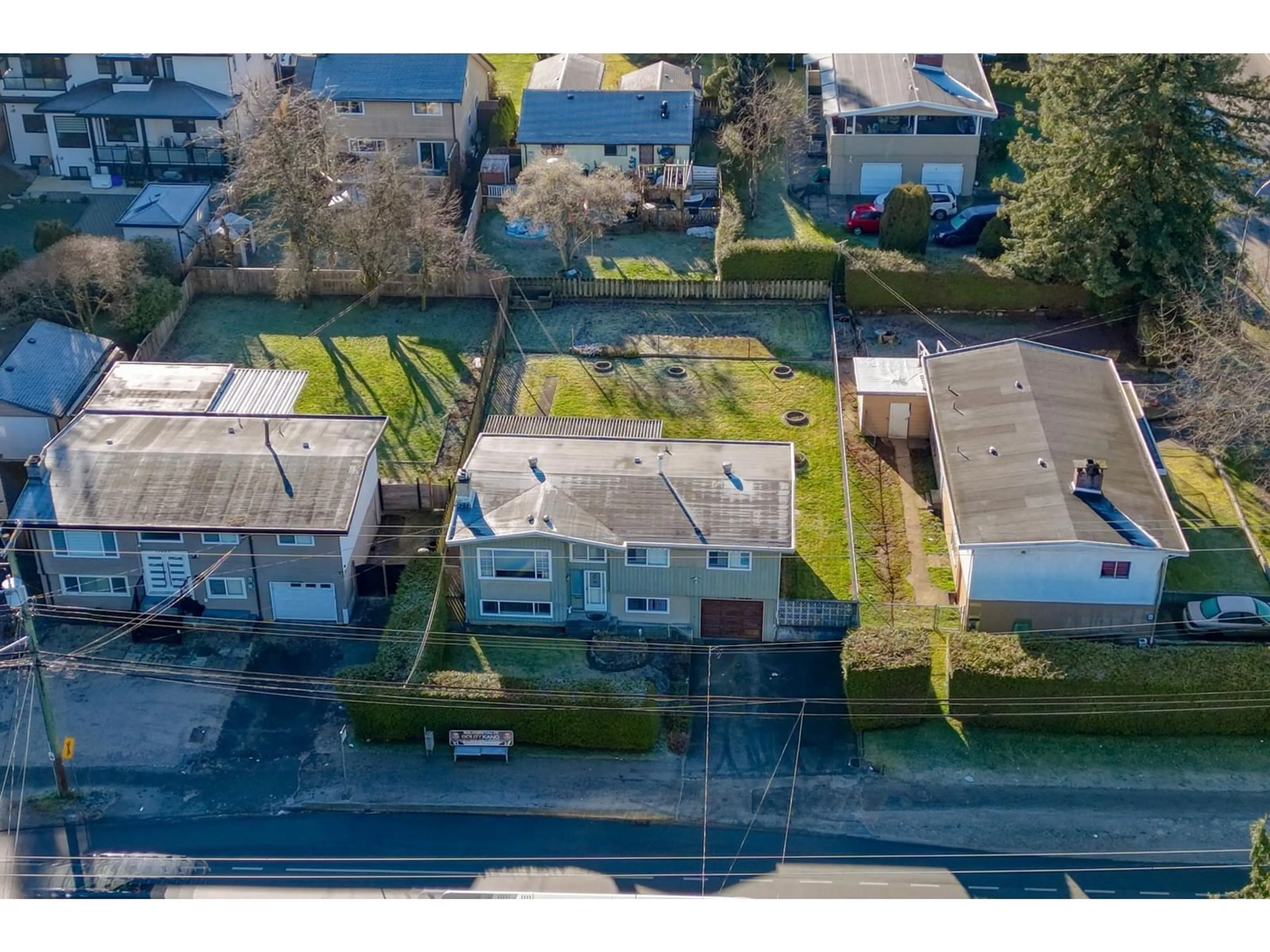 A pic from outside/outdoor area/front of a property/back of a property/a pic from drone, street for 11810 96 AVENUE, Delta British Columbia V4C3W5