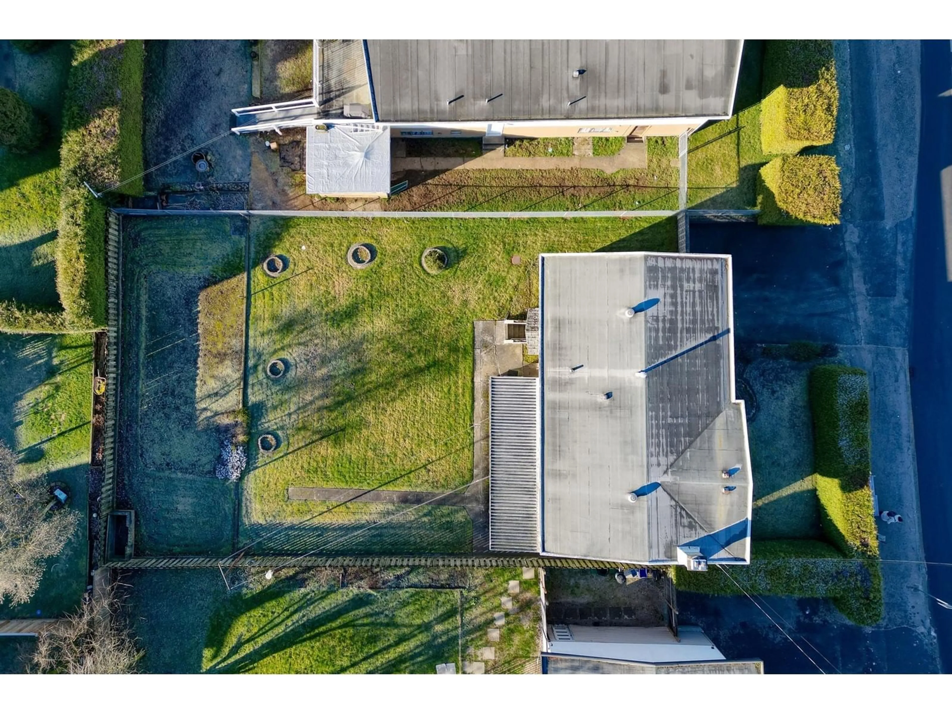 A pic from outside/outdoor area/front of a property/back of a property/a pic from drone, street for 11810 96 AVENUE, Delta British Columbia V4C3W5