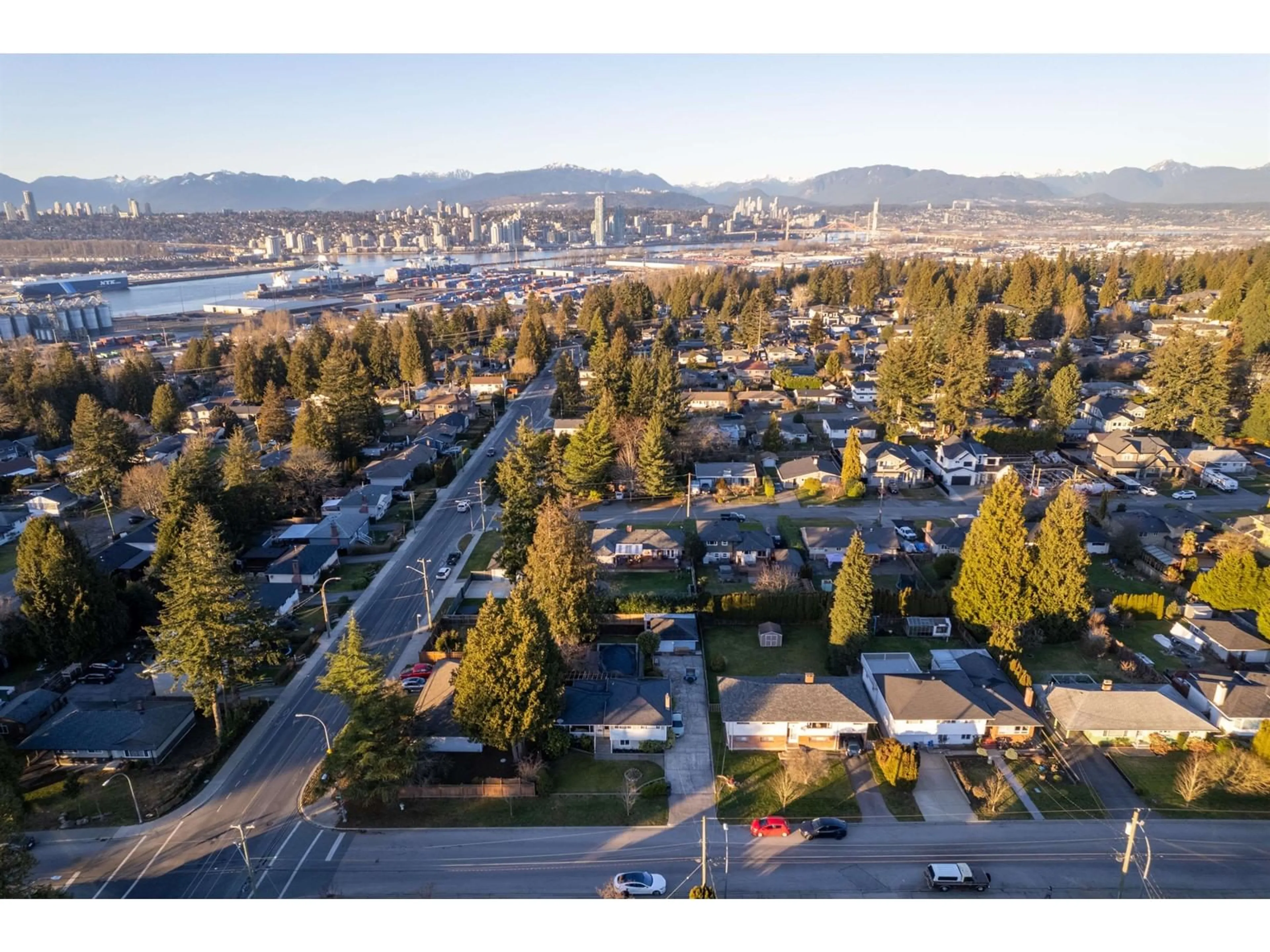 A pic from outside/outdoor area/front of a property/back of a property/a pic from drone, mountain view for 11423 94 AVENUE, Delta British Columbia V4C3R3