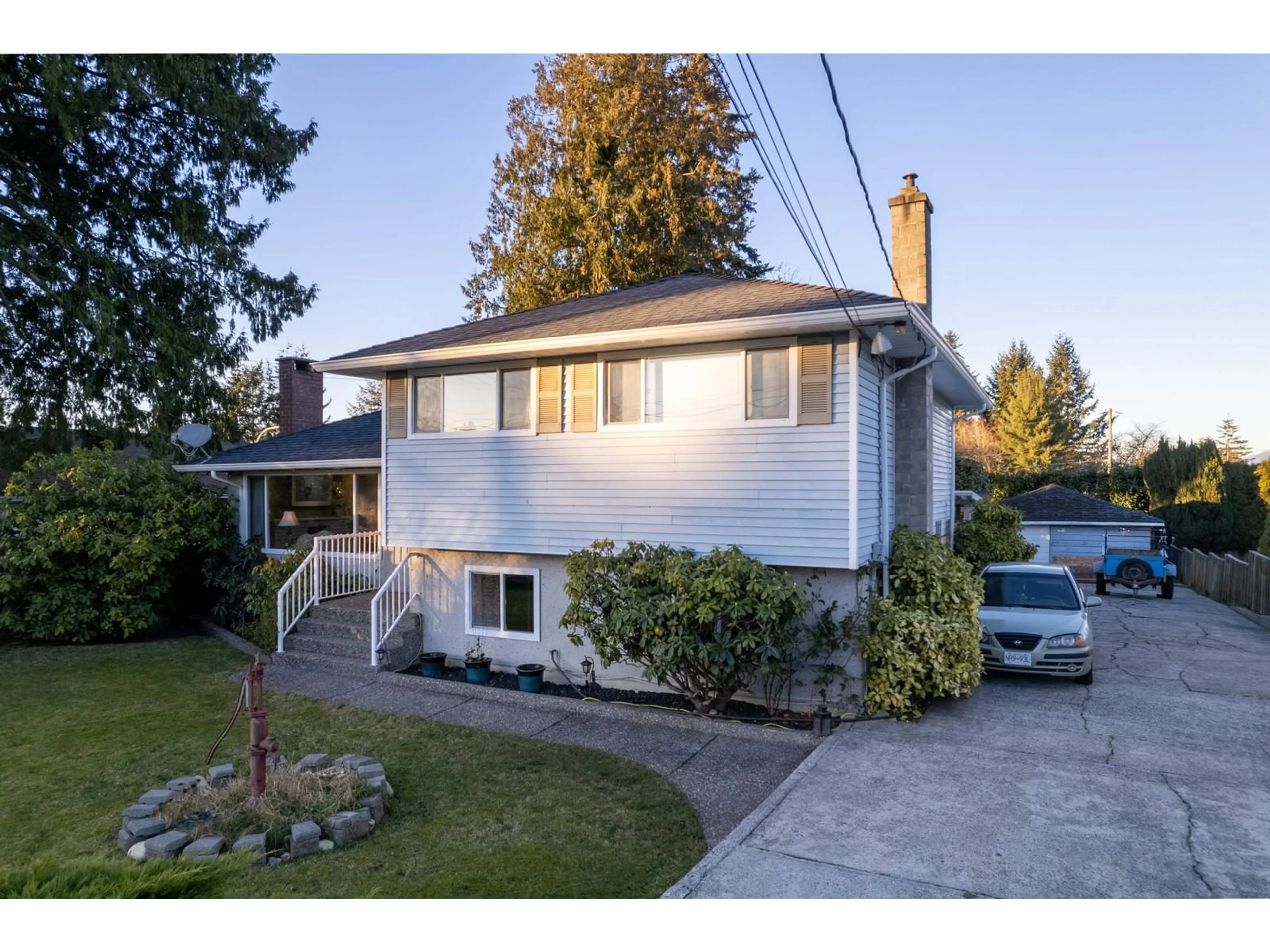 Home with vinyl exterior material, street for 11423 94 AVENUE, Delta British Columbia V4C3R3