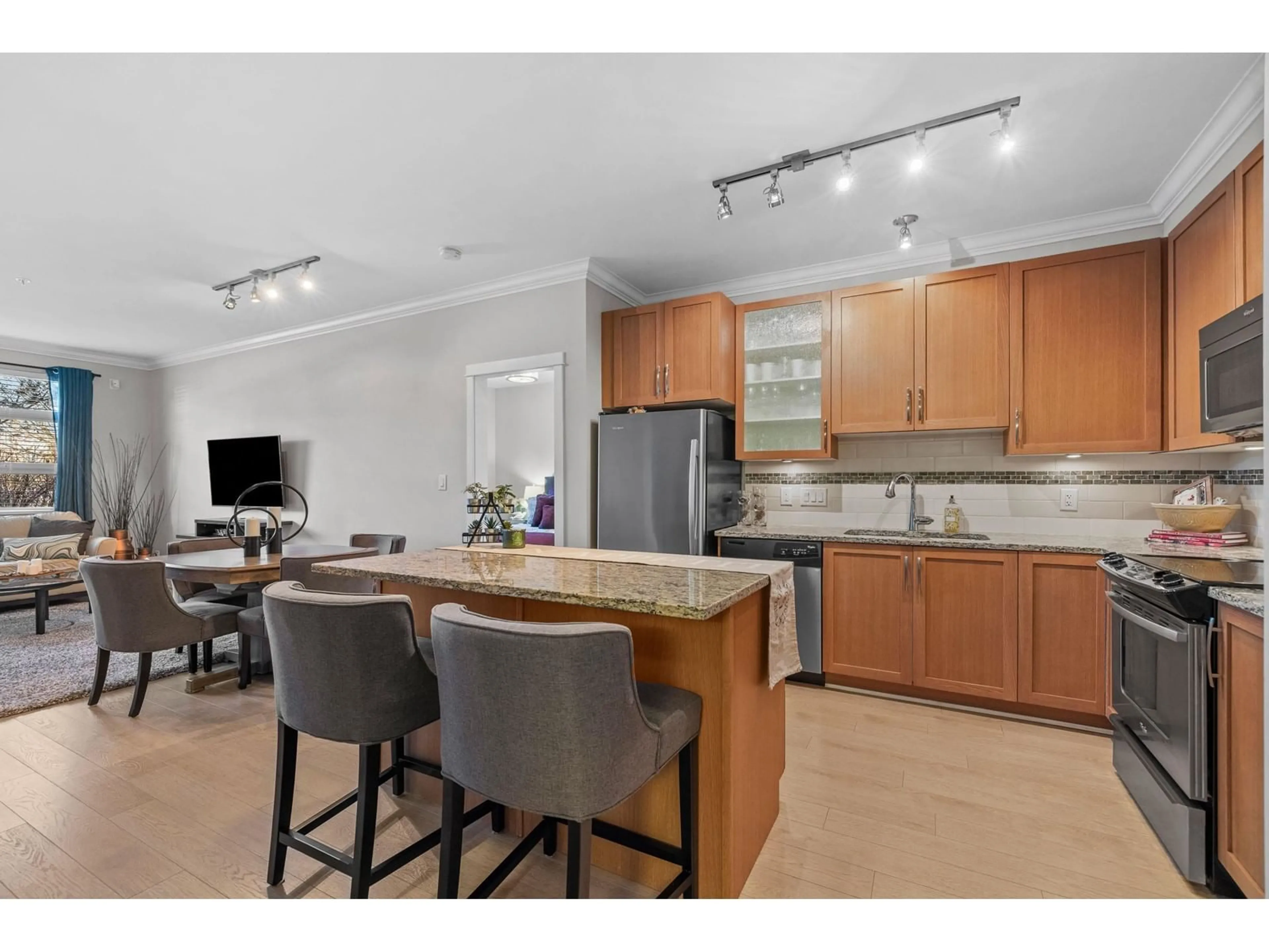 Open concept kitchen, unknown for 107 20861 83 AVENUE, Langley British Columbia V2Y0M8