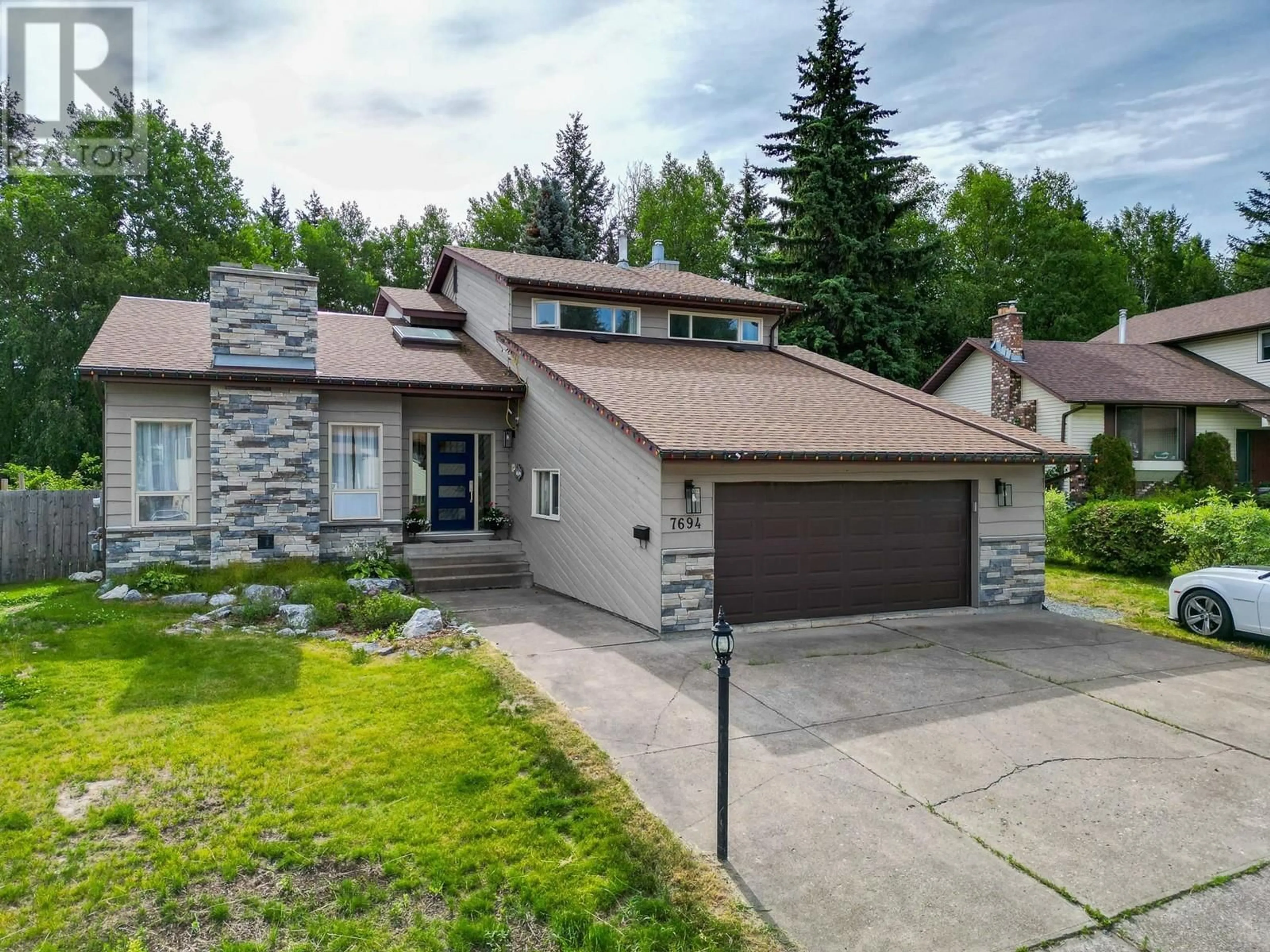 A pic from outside/outdoor area/front of a property/back of a property/a pic from drone, street for 7694 ST MARK CRESCENT, Prince George British Columbia V2N4B8