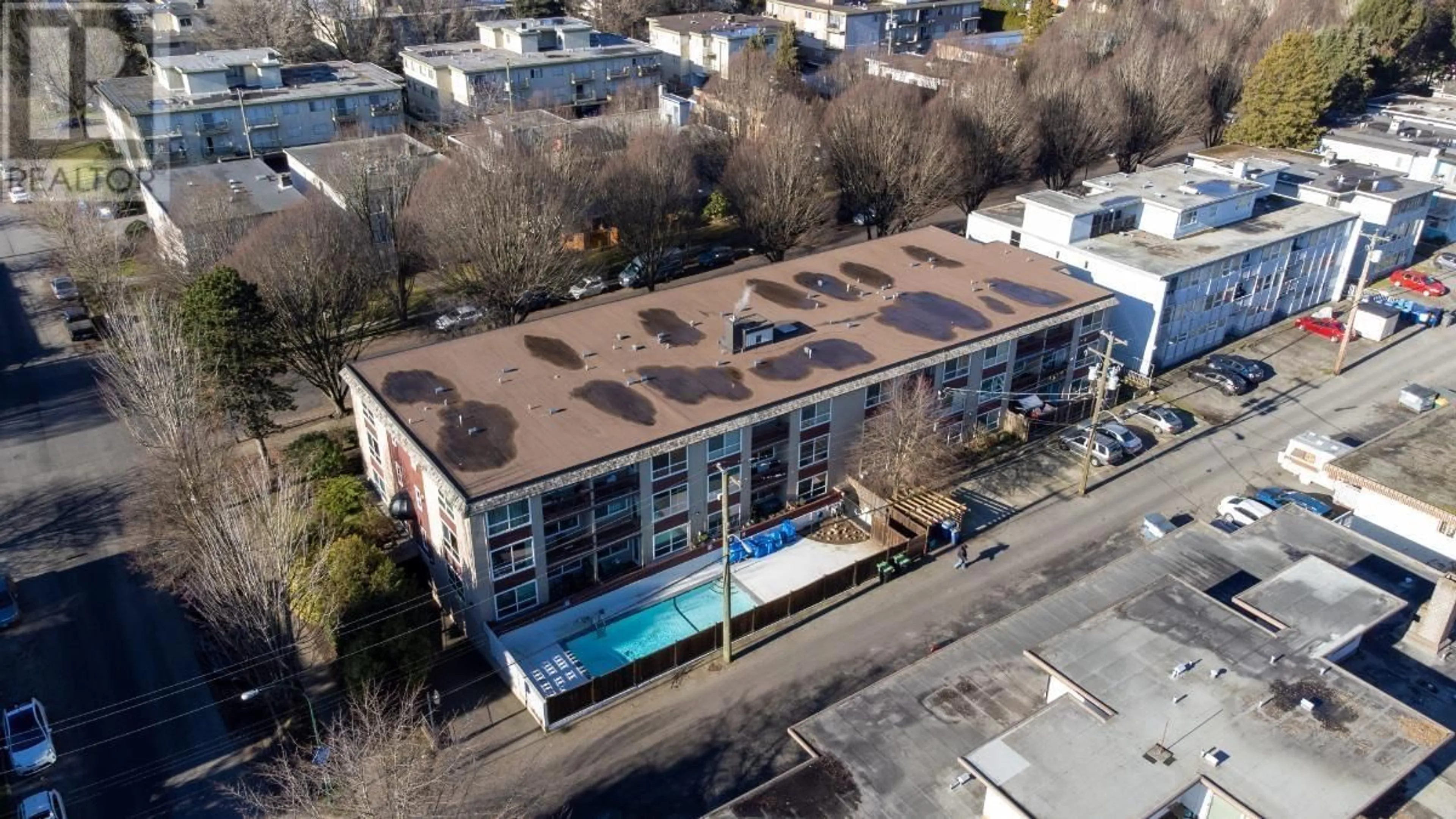 A pic from outside/outdoor area/front of a property/back of a property/a pic from drone, unknown for 203 8680 FREMLIN STREET, Vancouver British Columbia V6P3X3