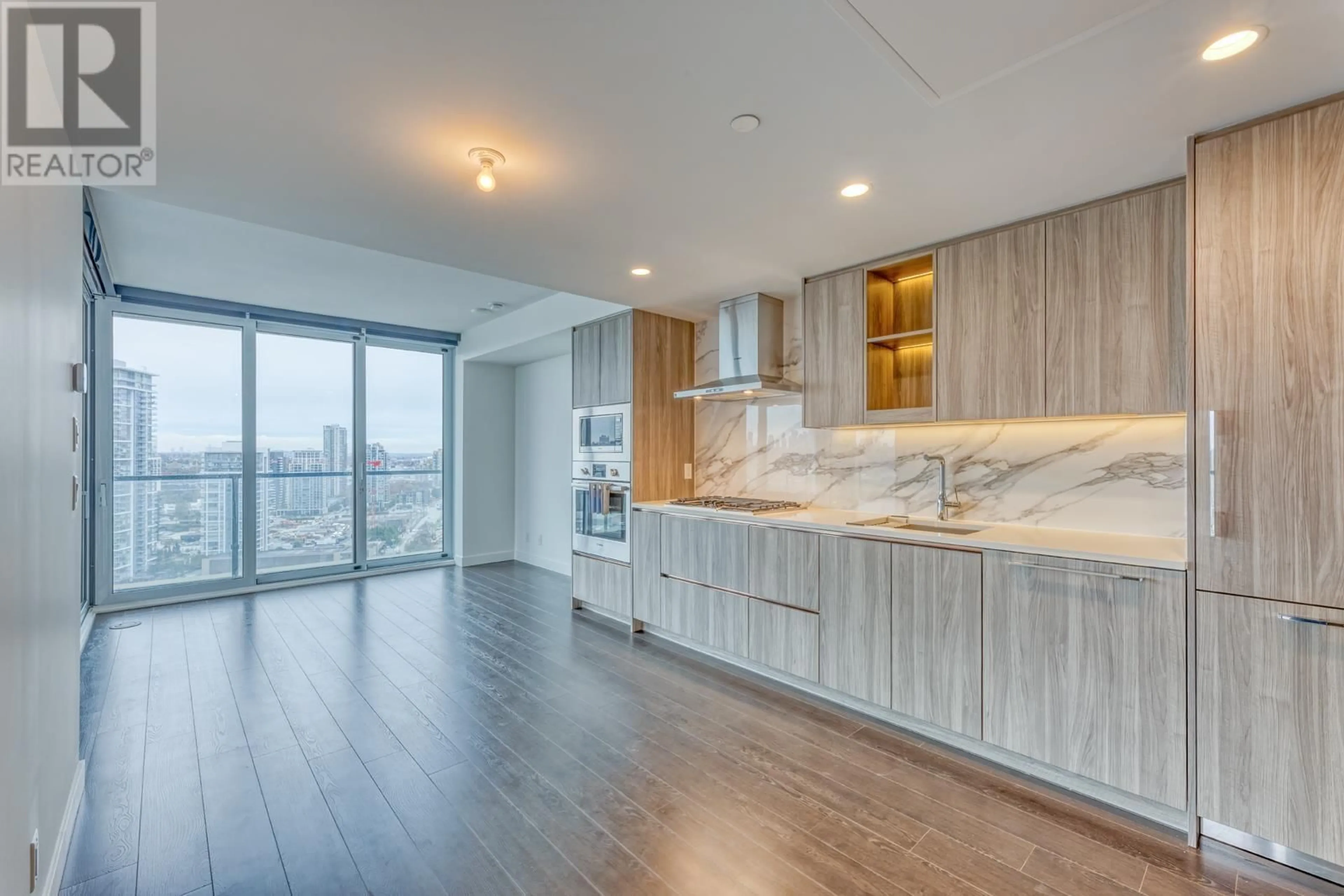 Open concept kitchen, wood/laminate floor for 1909 - 4880 LOUGHEED HIGHWAY, Burnaby British Columbia V5C5X3