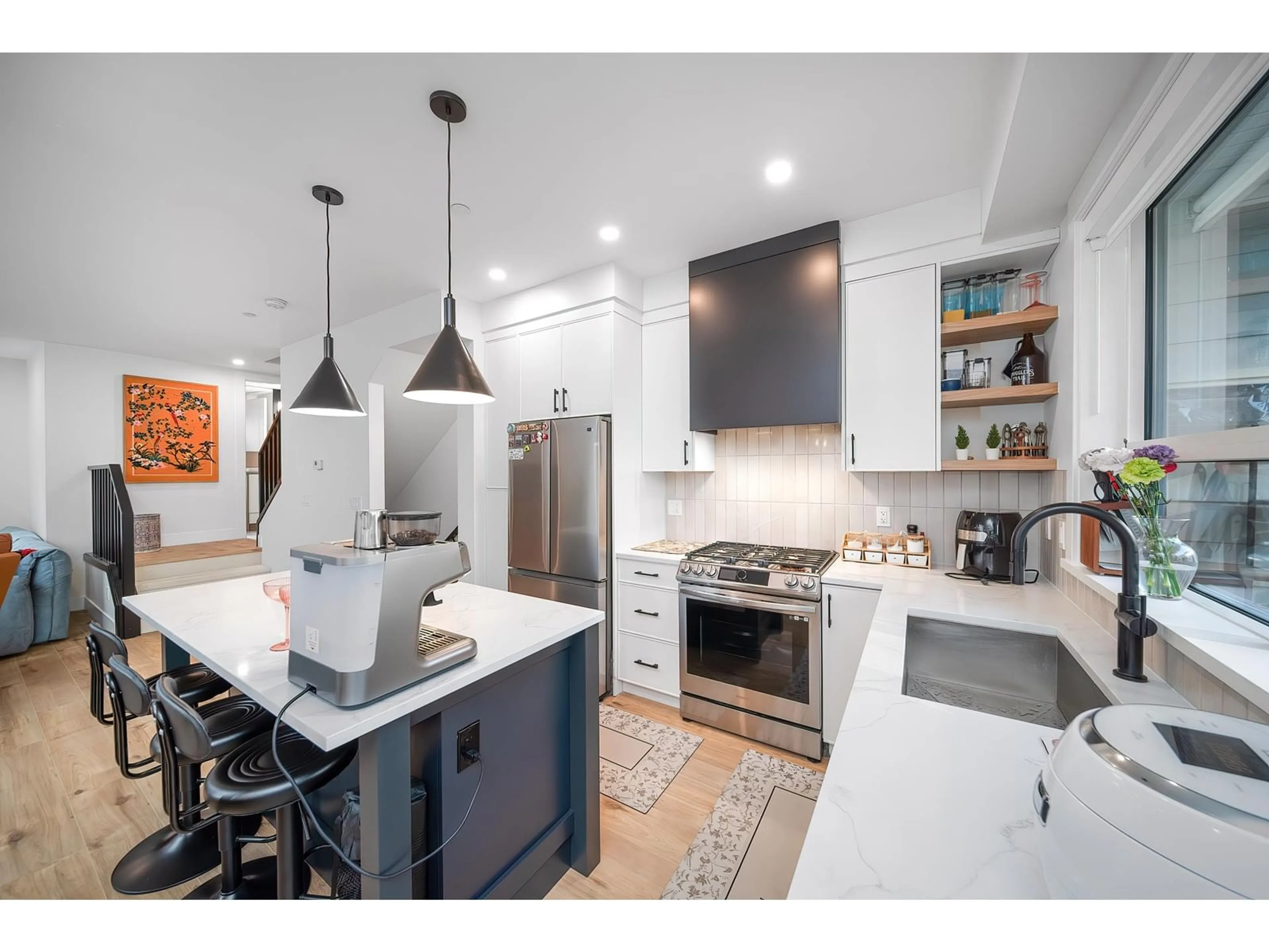 Open concept kitchen, ceramic/tile floor for 23 - 19918 75A, Langley British Columbia V2Y3L1