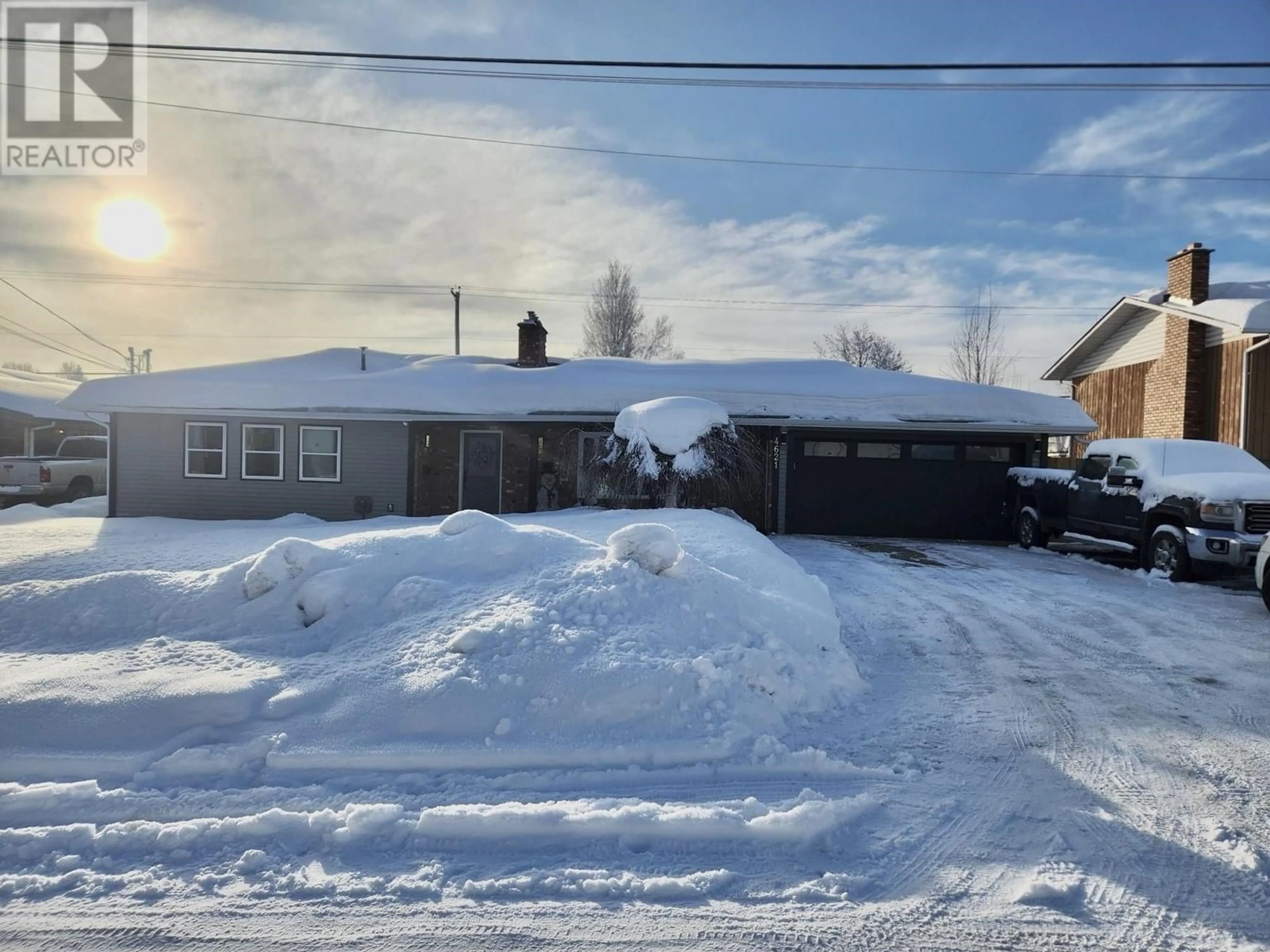 A pic from outside/outdoor area/front of a property/back of a property/a pic from drone, street for 4621 CROCUS CRESCENT, Prince George British Columbia V2K3H4