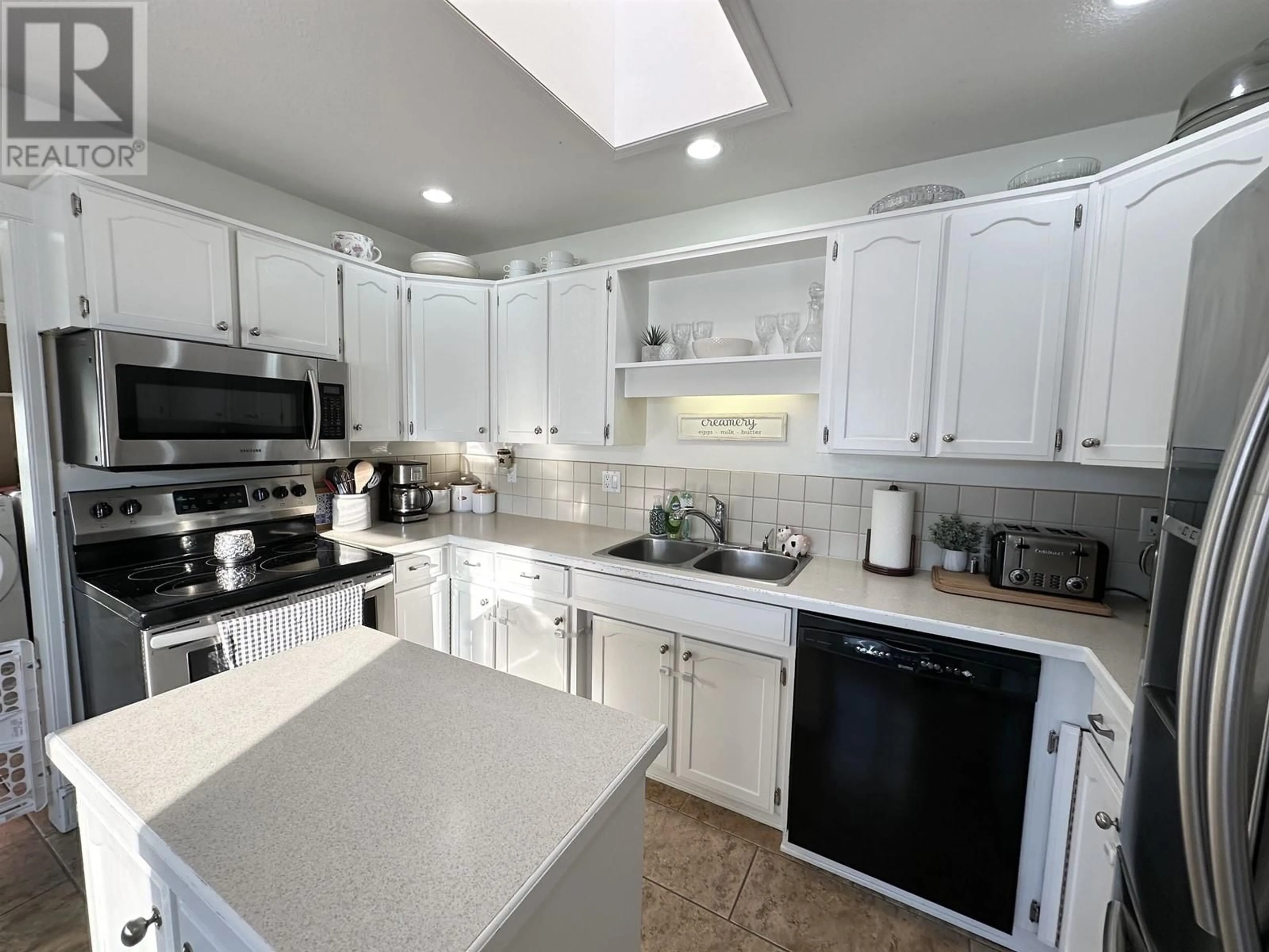 Open concept kitchen, ceramic/tile floor for 4621 CROCUS CRESCENT, Prince George British Columbia V2K3H4