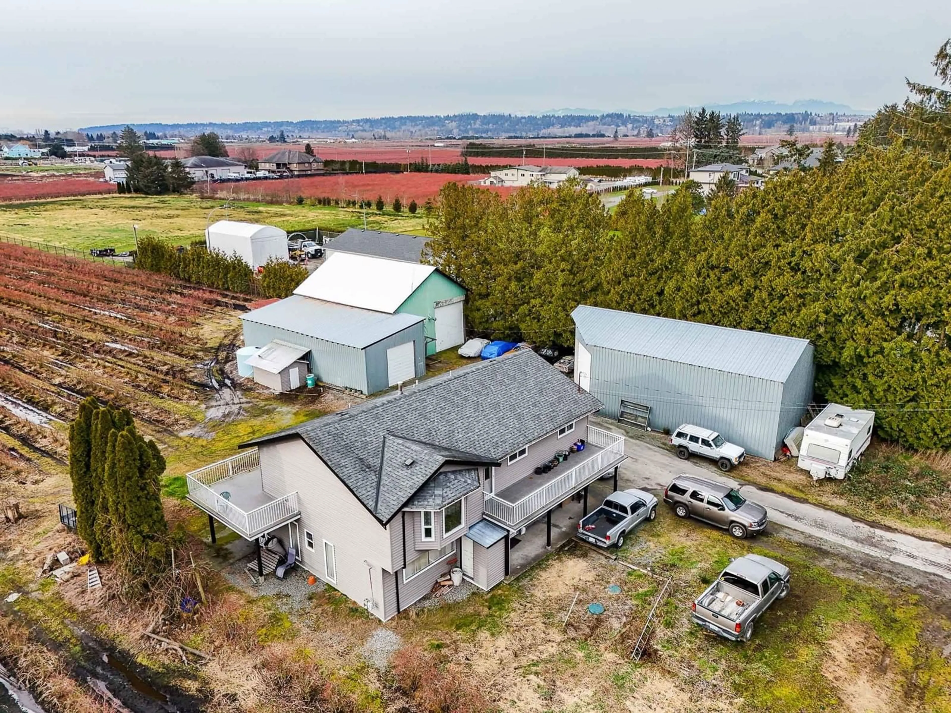 A pic from outside/outdoor area/front of a property/back of a property/a pic from drone, building for 3885 152 STREET, Surrey British Columbia V3Z1G7