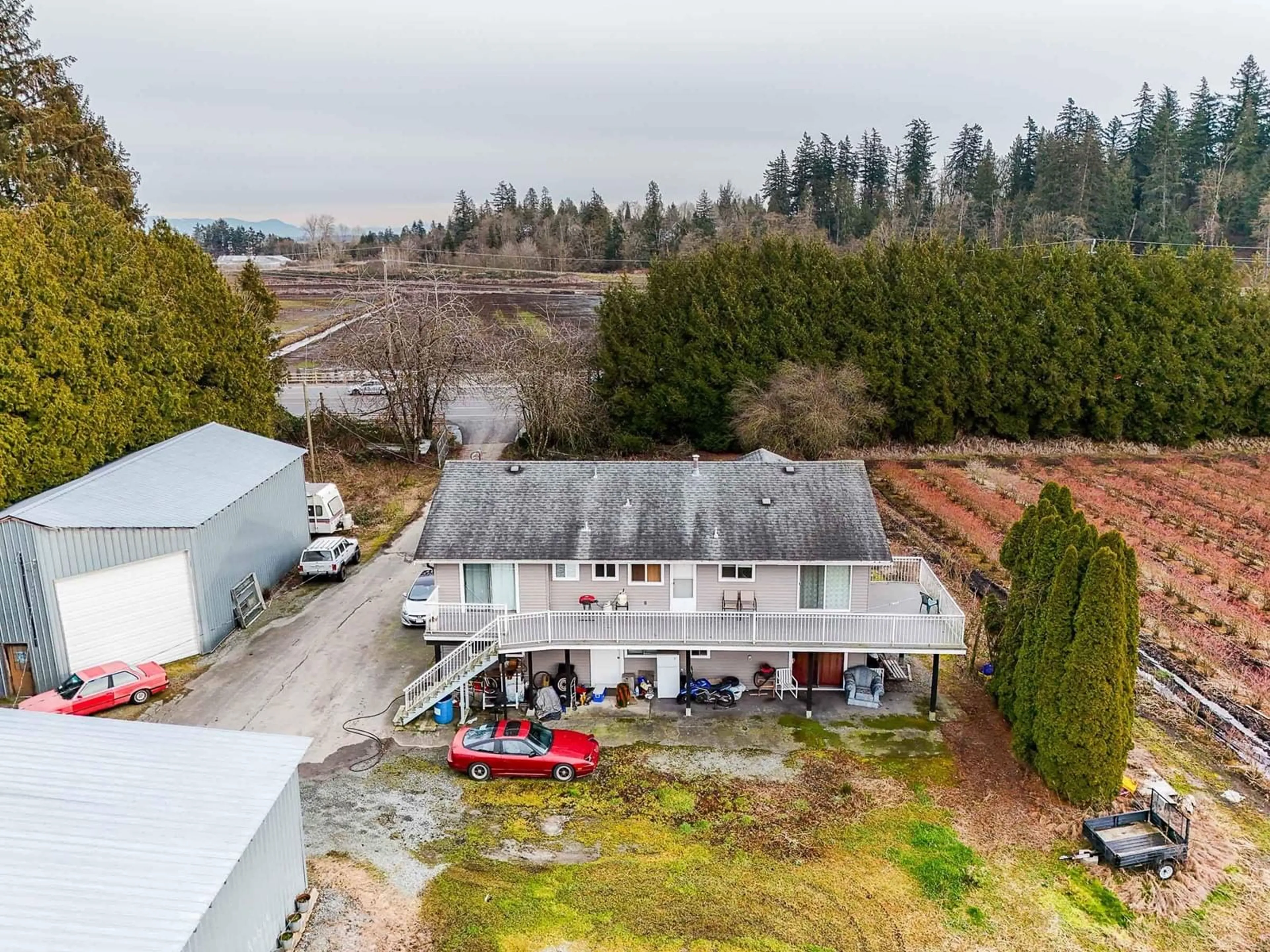 A pic from outside/outdoor area/front of a property/back of a property/a pic from drone, building for 3885 152 STREET, Surrey British Columbia V3Z1G7