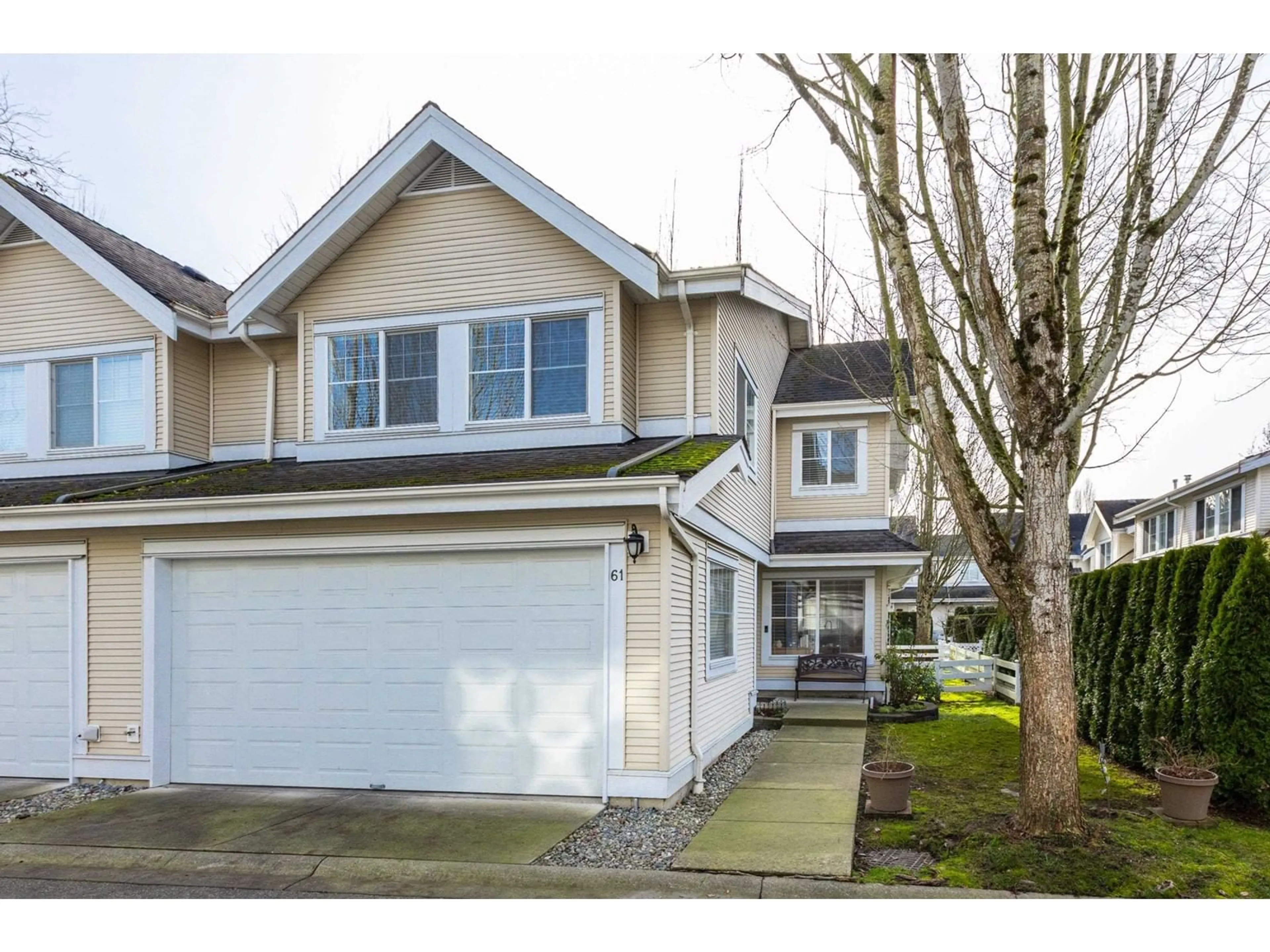 Home with vinyl exterior material, street for 61 17097 64 AVENUE, Surrey British Columbia V3S1Y5