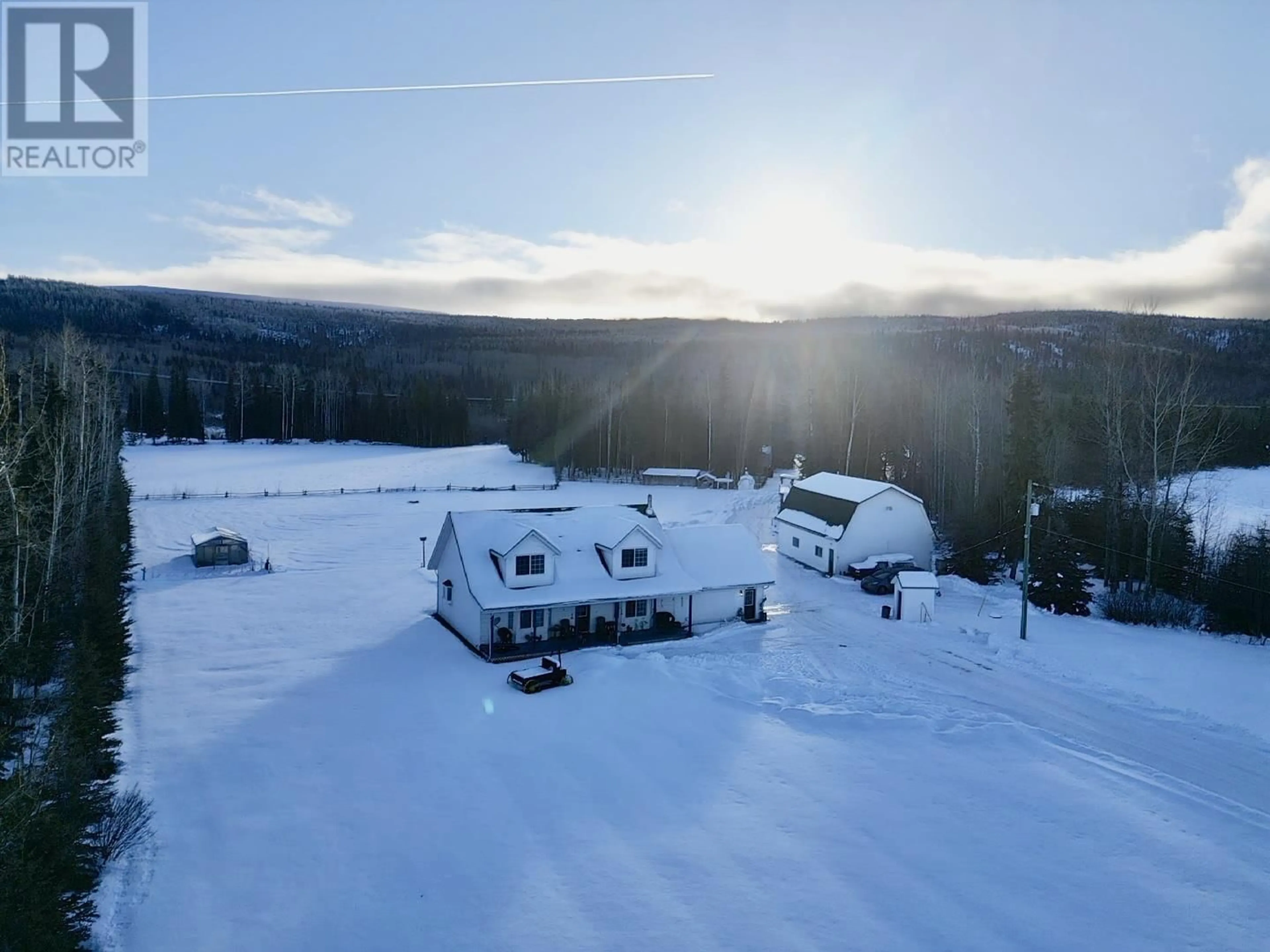 A pic from outside/outdoor area/front of a property/back of a property/a pic from drone, mountain view for 15547 PINE ROAD, Endako British Columbia V0J1L0