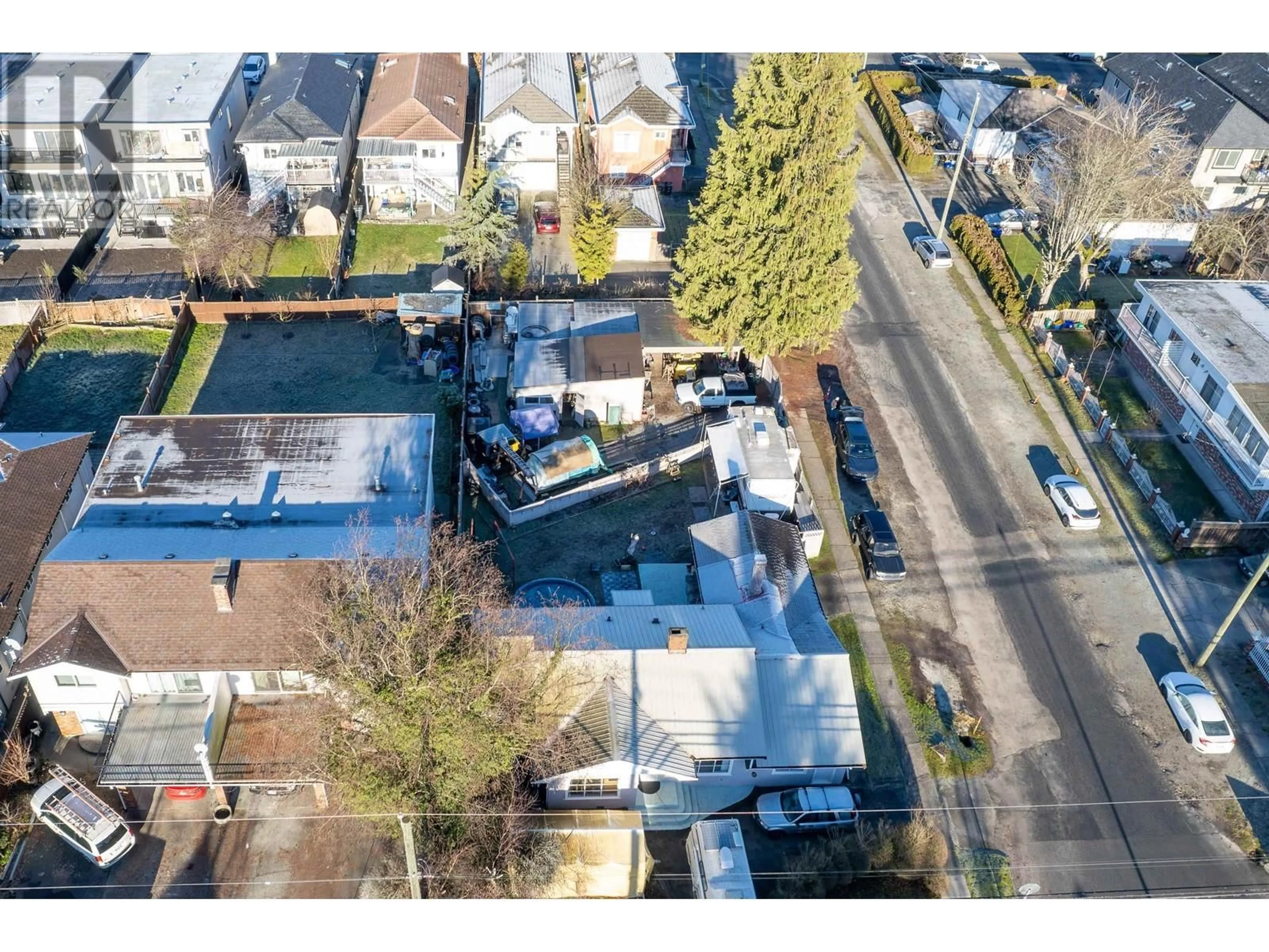 A pic from outside/outdoor area/front of a property/back of a property/a pic from drone, street for 7323 10 AVENUE, Burnaby British Columbia V3N2R8