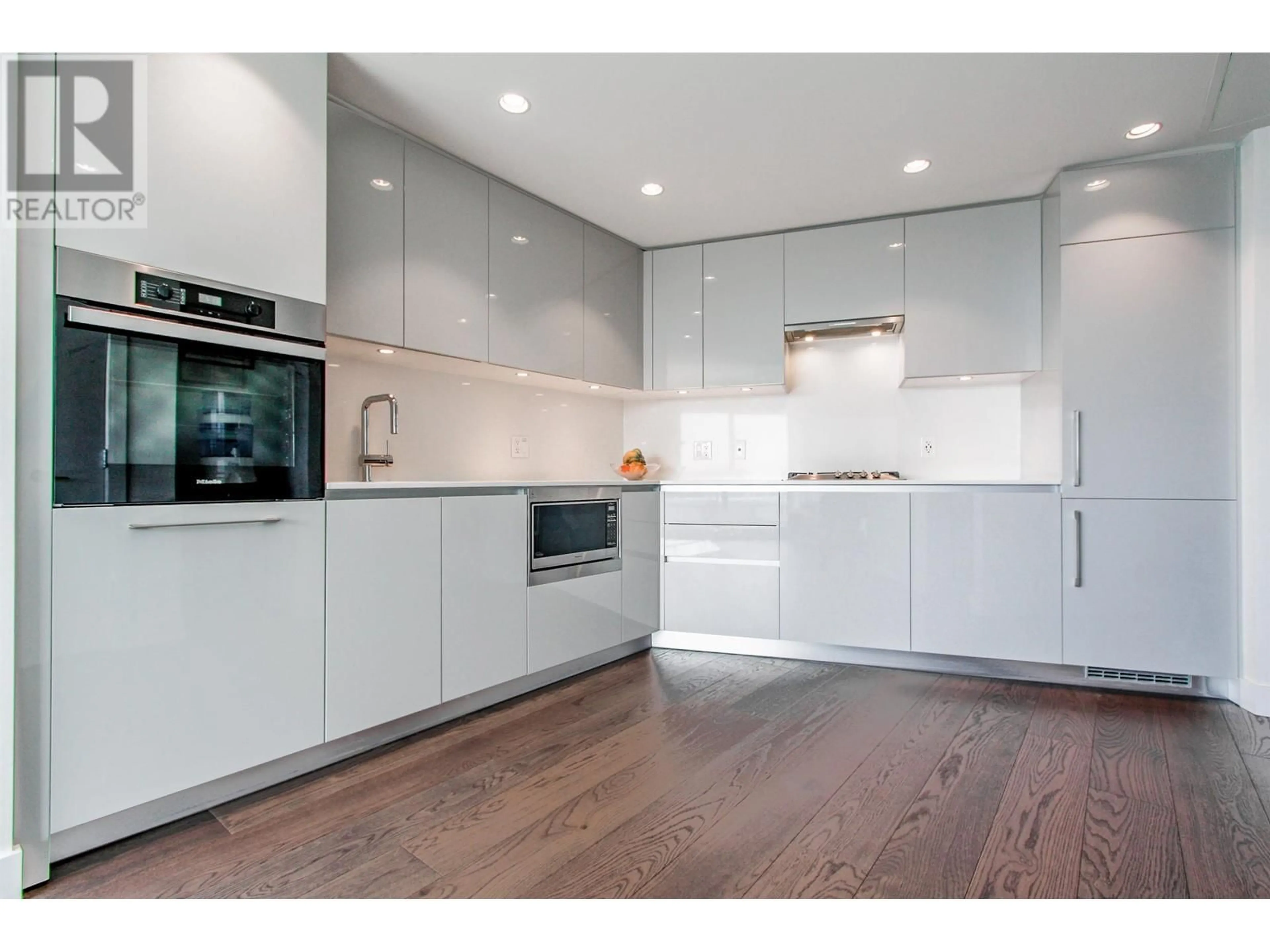 Contemporary kitchen, wood/laminate floor for 1203 5788 GILBERT ROAD, Richmond British Columbia V7C0G1