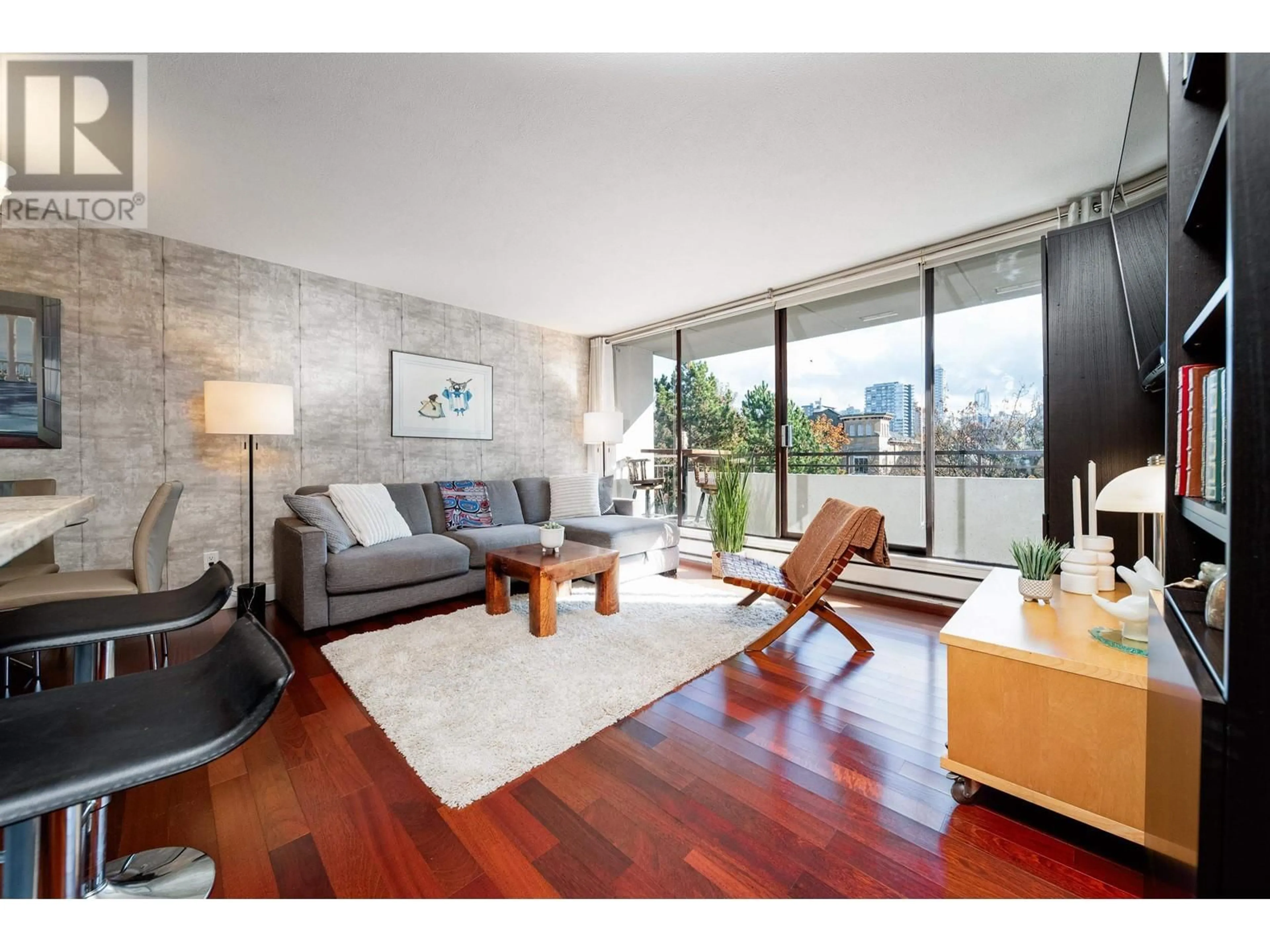 Living room with furniture, wood/laminate floor for 706 1725 PENDRELL STREET, Vancouver British Columbia V6G2X7