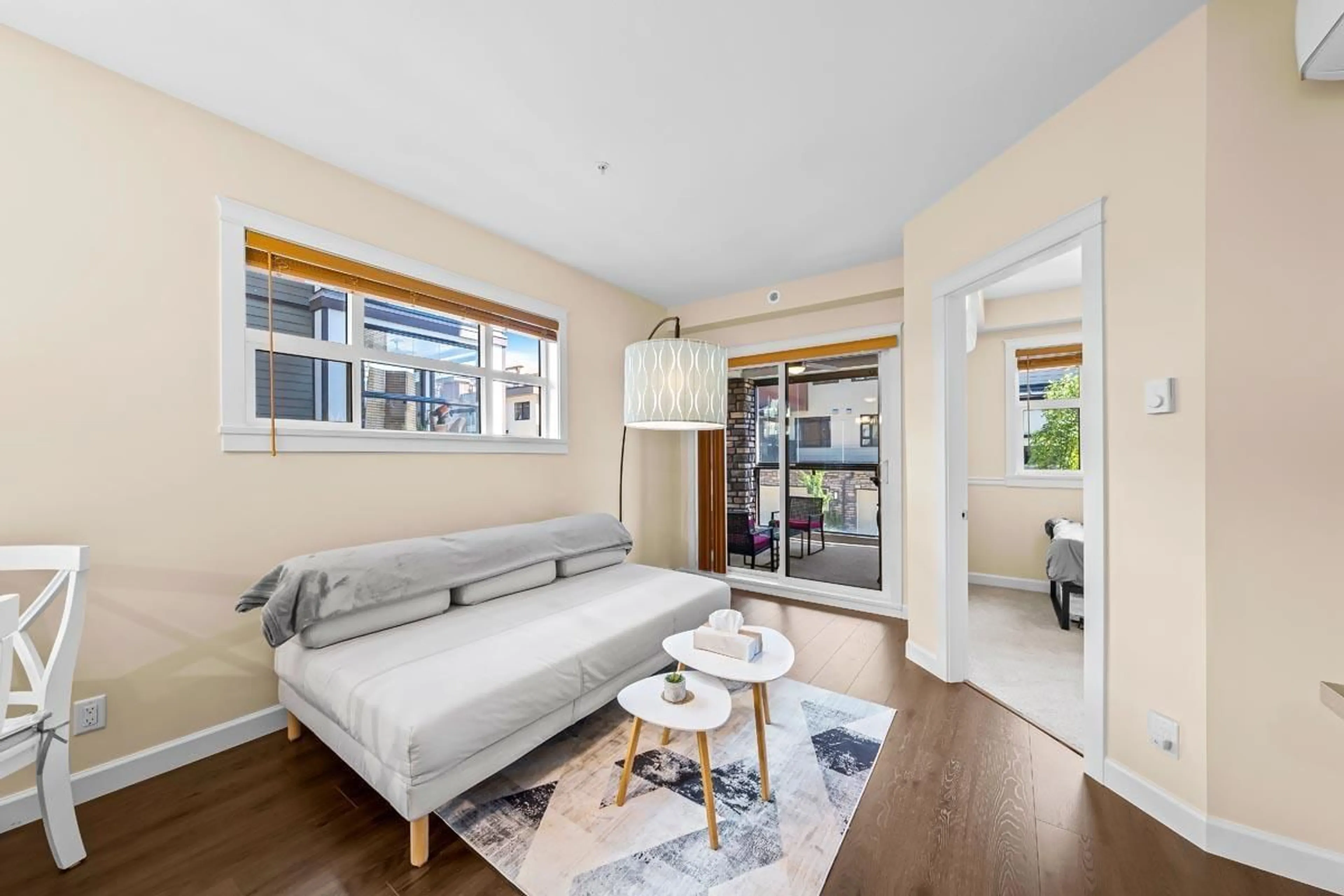 Living room with furniture, wood/laminate floor for 206 20367 85 AVENUE, Langley British Columbia V2Y3R1