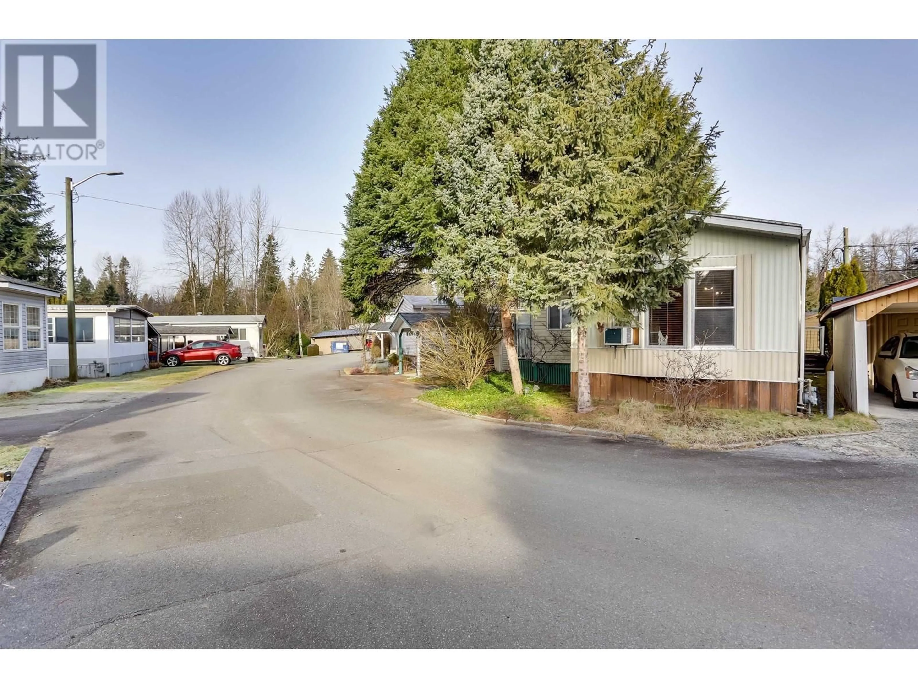 A pic from outside/outdoor area/front of a property/back of a property/a pic from drone, street for 12 12868 229 STREET, Maple Ridge British Columbia V2X6R1