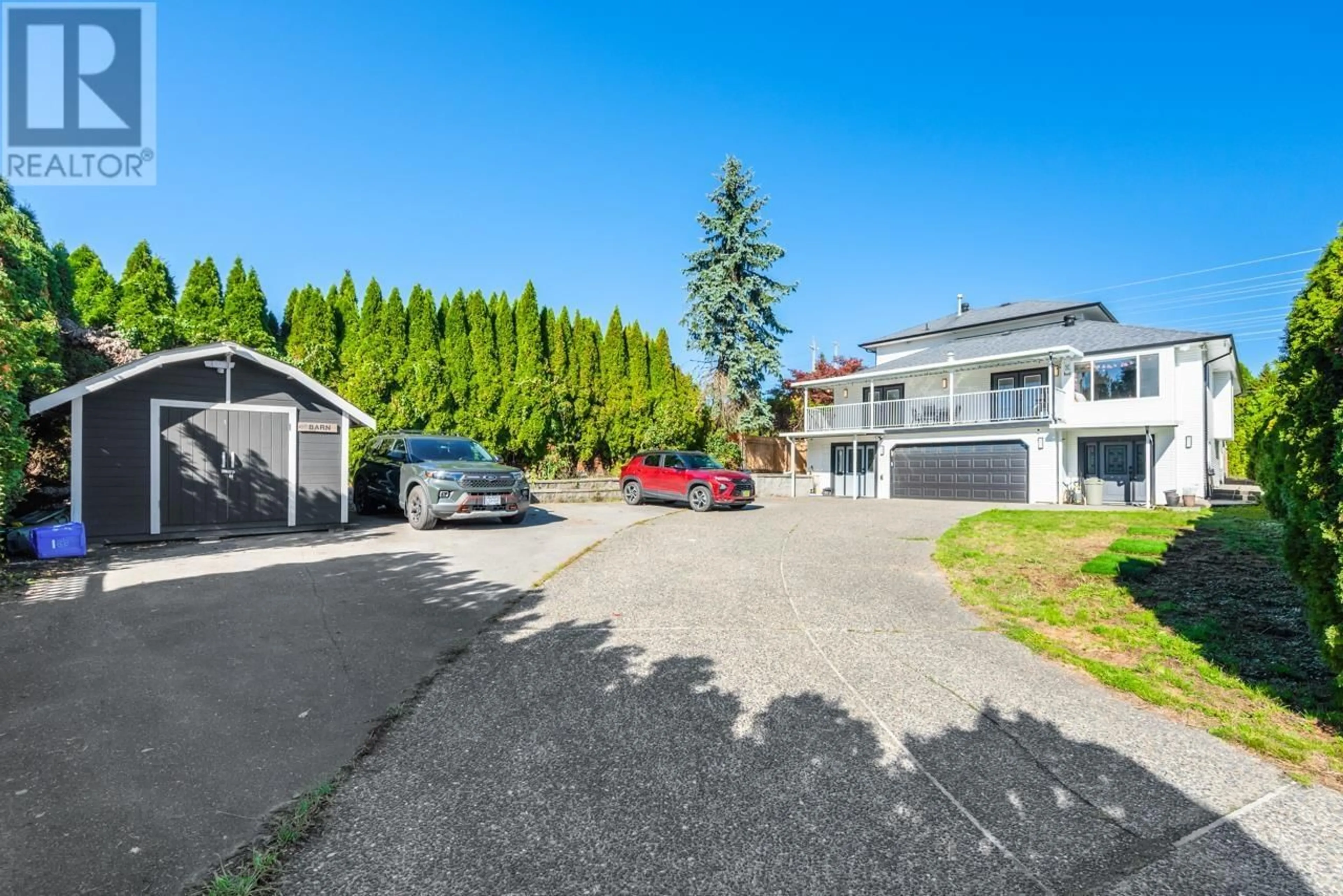 A pic from outside/outdoor area/front of a property/back of a property/a pic from drone, street for 24910 DEWDNEY TRUNK ROAD, Maple Ridge British Columbia V4R2E3