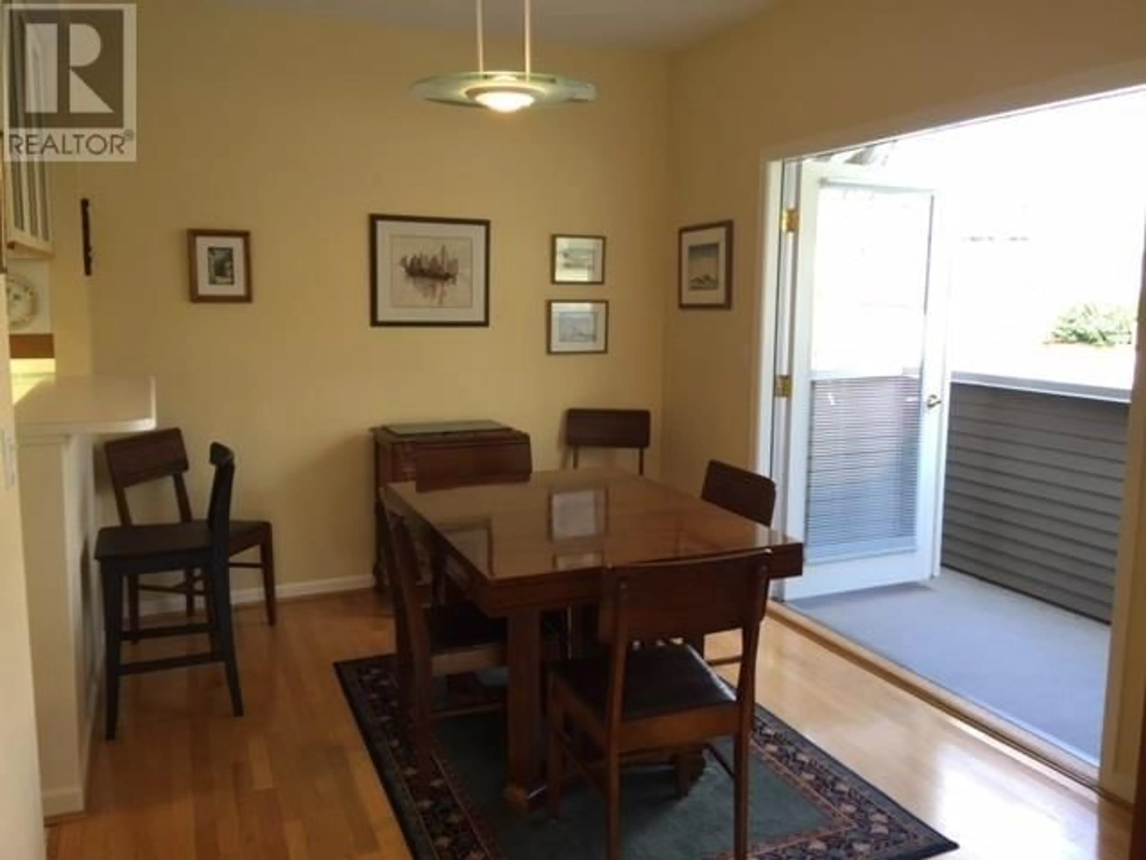 Dining room, wood/laminate floor for 1903 W 14TH AVENUE, Vancouver British Columbia V6J2K1