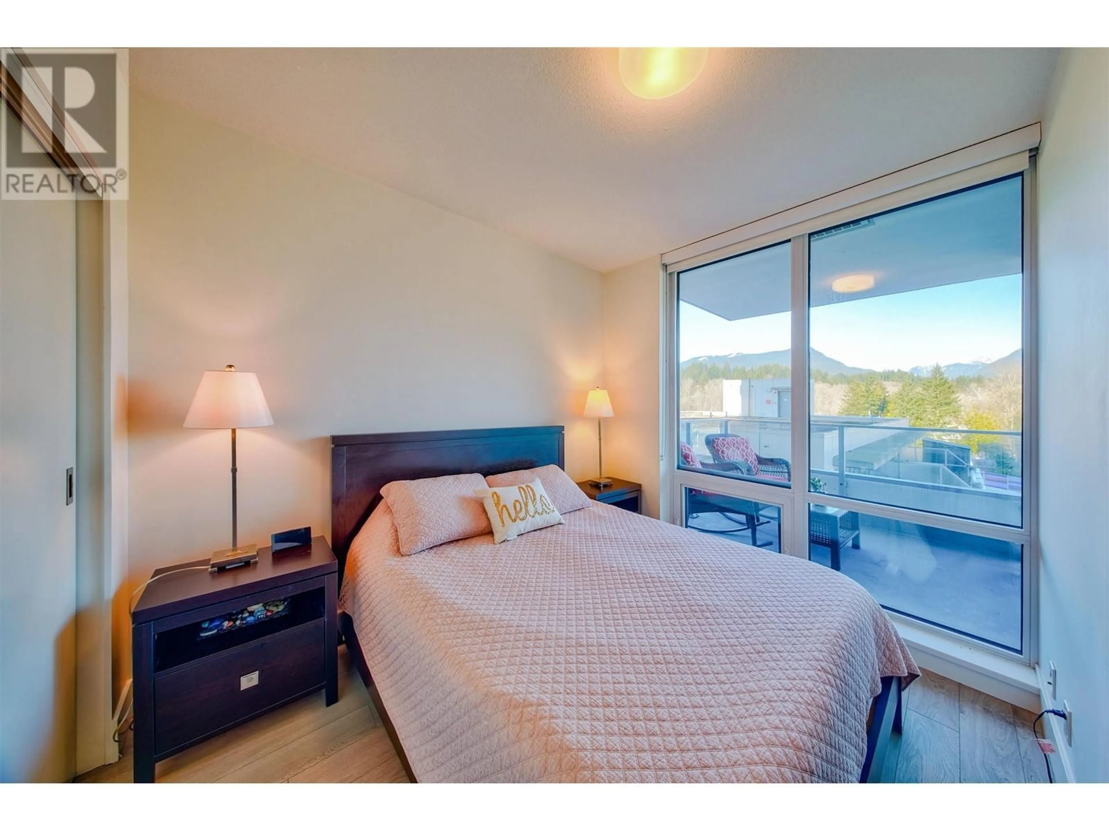 Bedroom with bed, wood/laminate floor for 709 680 SEYLYNN CRESCENT, North Vancouver British Columbia V7J0B5