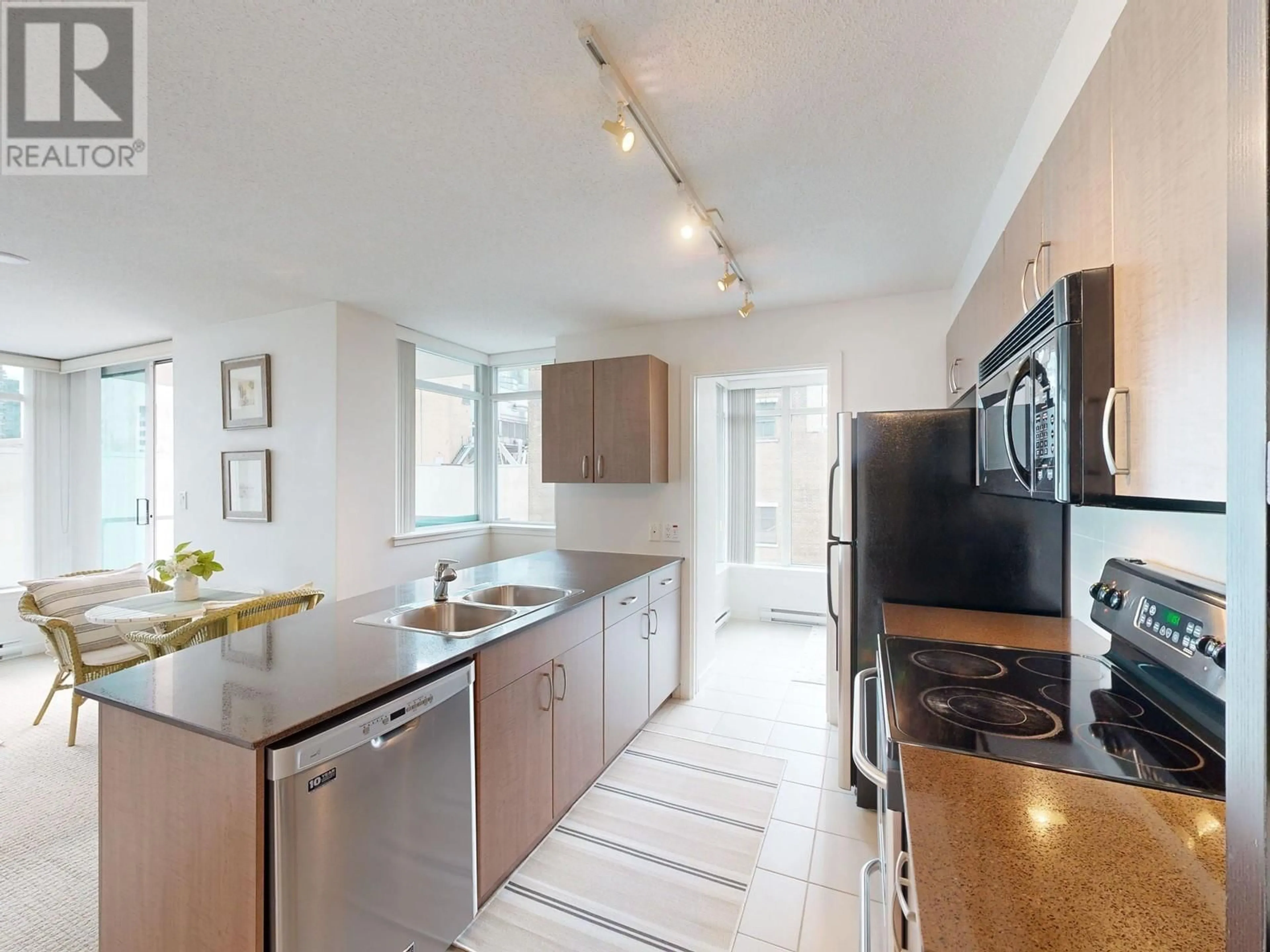 Open concept kitchen, unknown for 1116 610 GRANVILLE STREET, Vancouver British Columbia V6C3T3