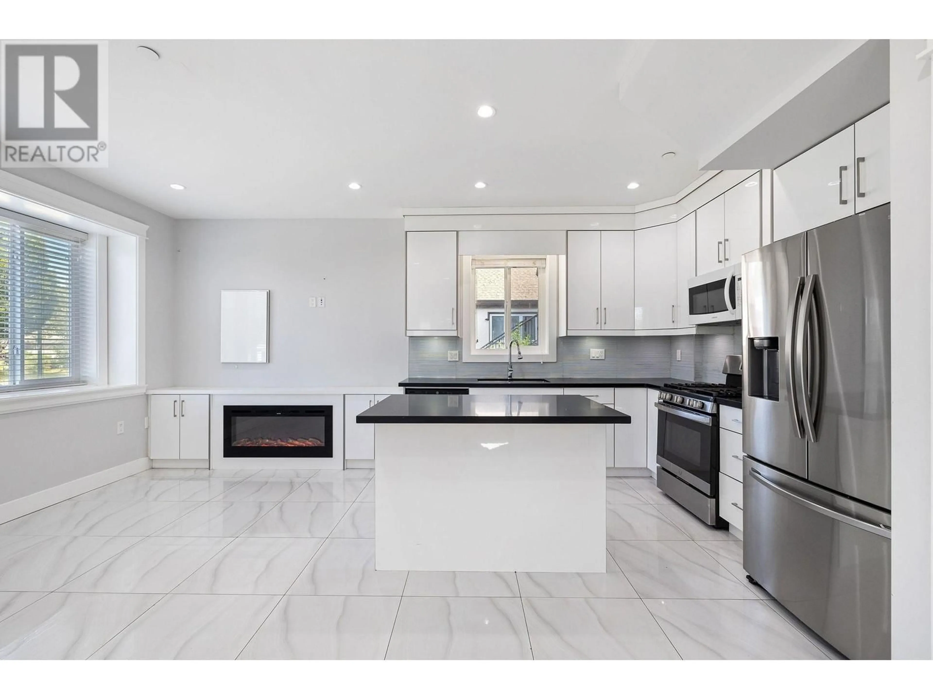 Contemporary kitchen, ceramic/tile floor for 1 2430 E 41 AVENUE, Vancouver British Columbia V5R2W4