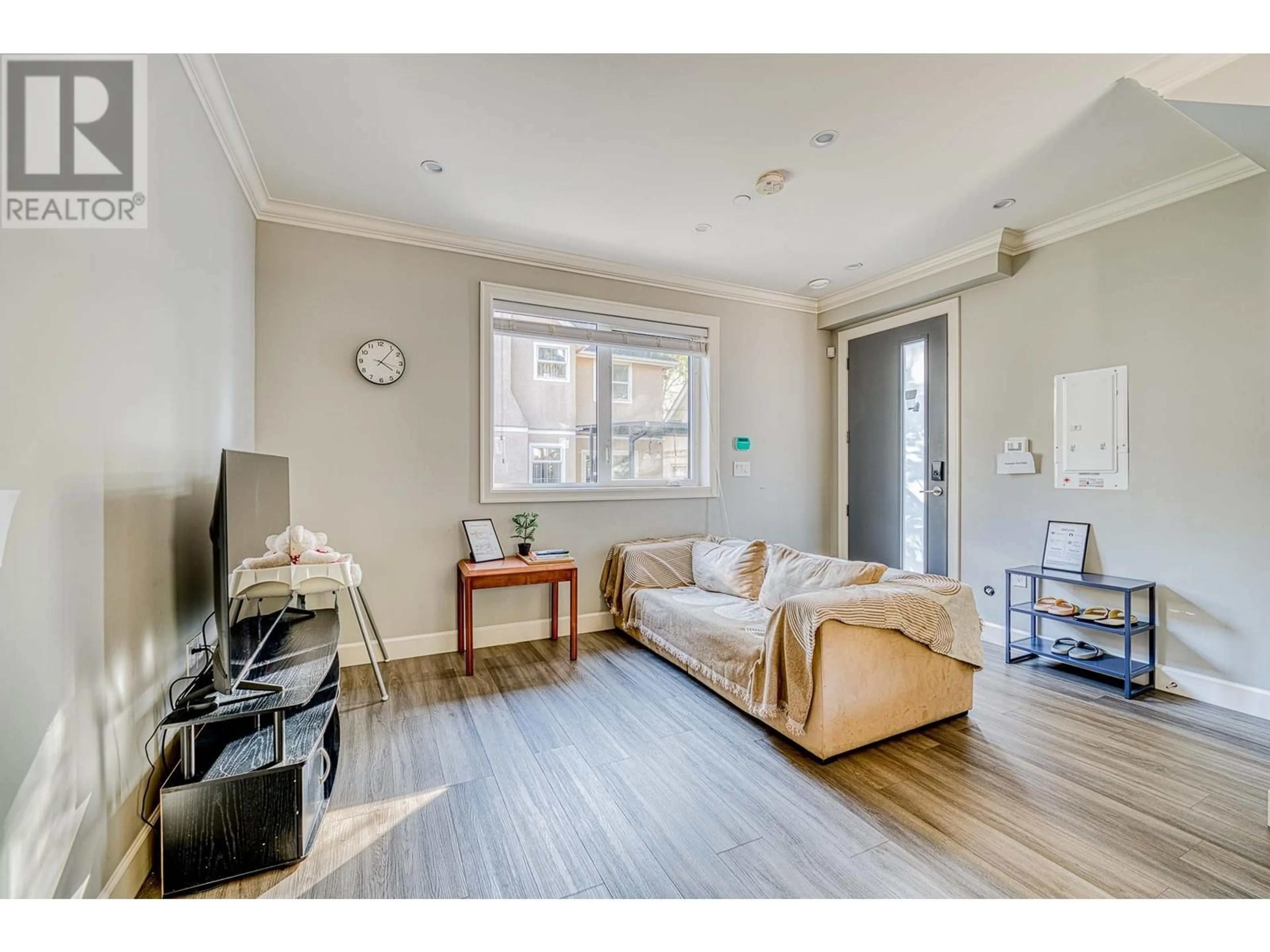 Living room with furniture, wood/laminate floor for 3657 W 29TH AVENUE, Vancouver British Columbia V6S1T5