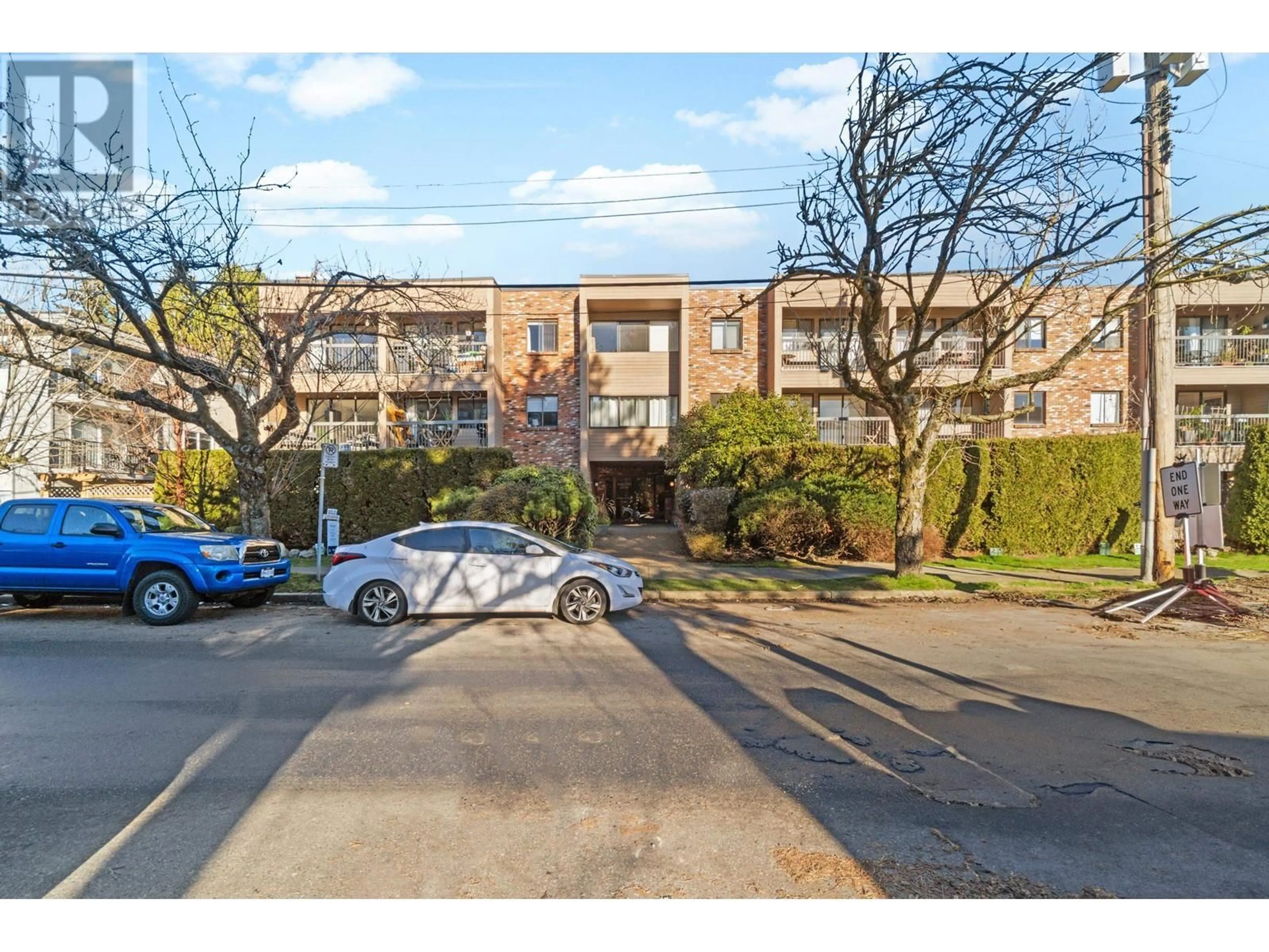 A pic from outside/outdoor area/front of a property/back of a property/a pic from drone, street for 201 1825 W 8TH AVENUE, Vancouver British Columbia V6J1V9