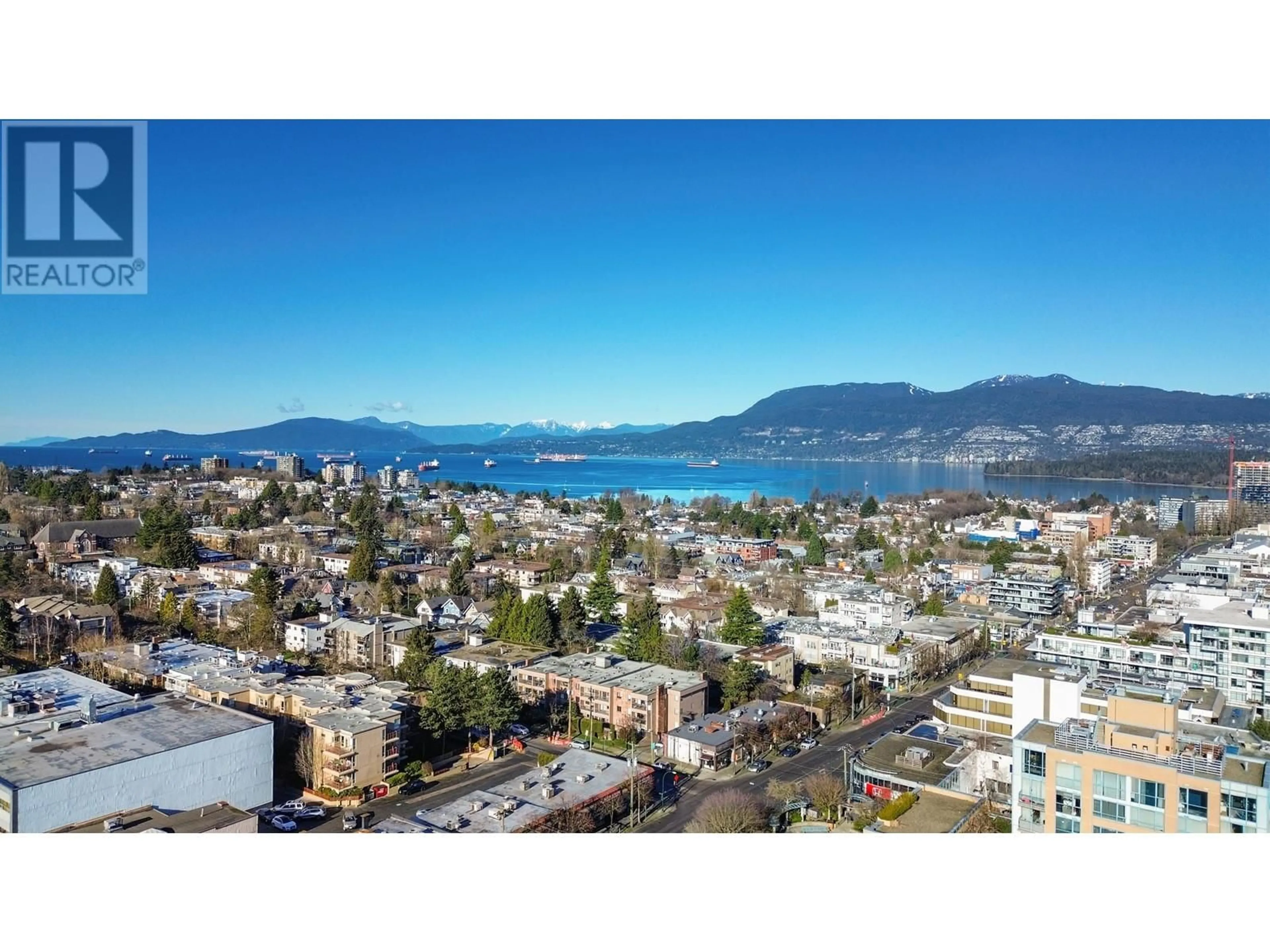 A pic from outside/outdoor area/front of a property/back of a property/a pic from drone, water/lake/river/ocean view for 201 1825 W 8TH AVENUE, Vancouver British Columbia V6J1V9