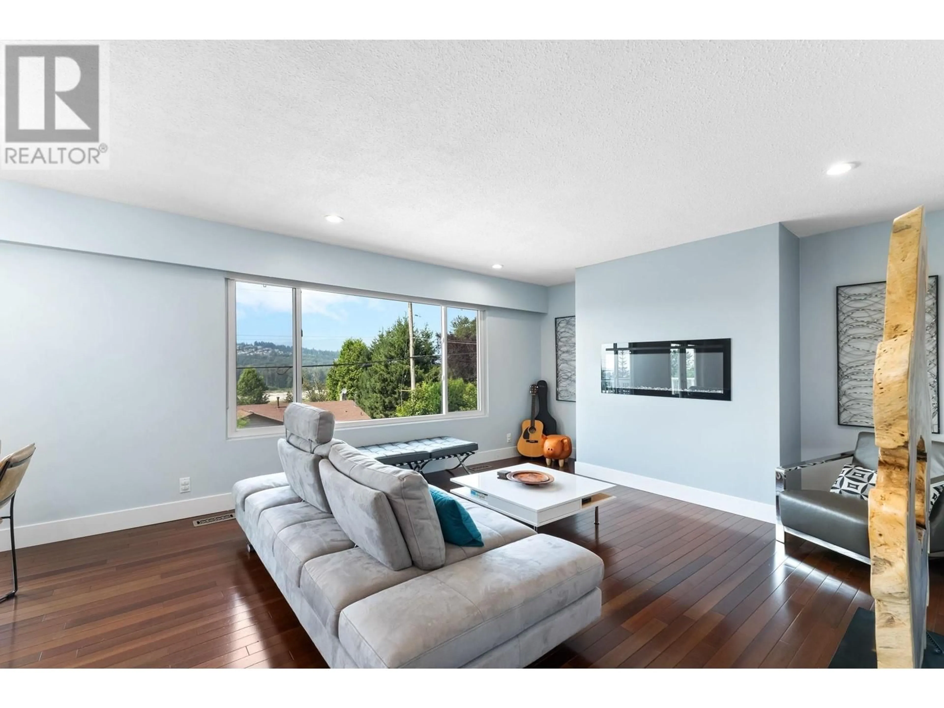 Living room with furniture, wood/laminate floor for 1480 ELINOR CRESCENT, Port Coquitlam British Columbia V3C2Y5