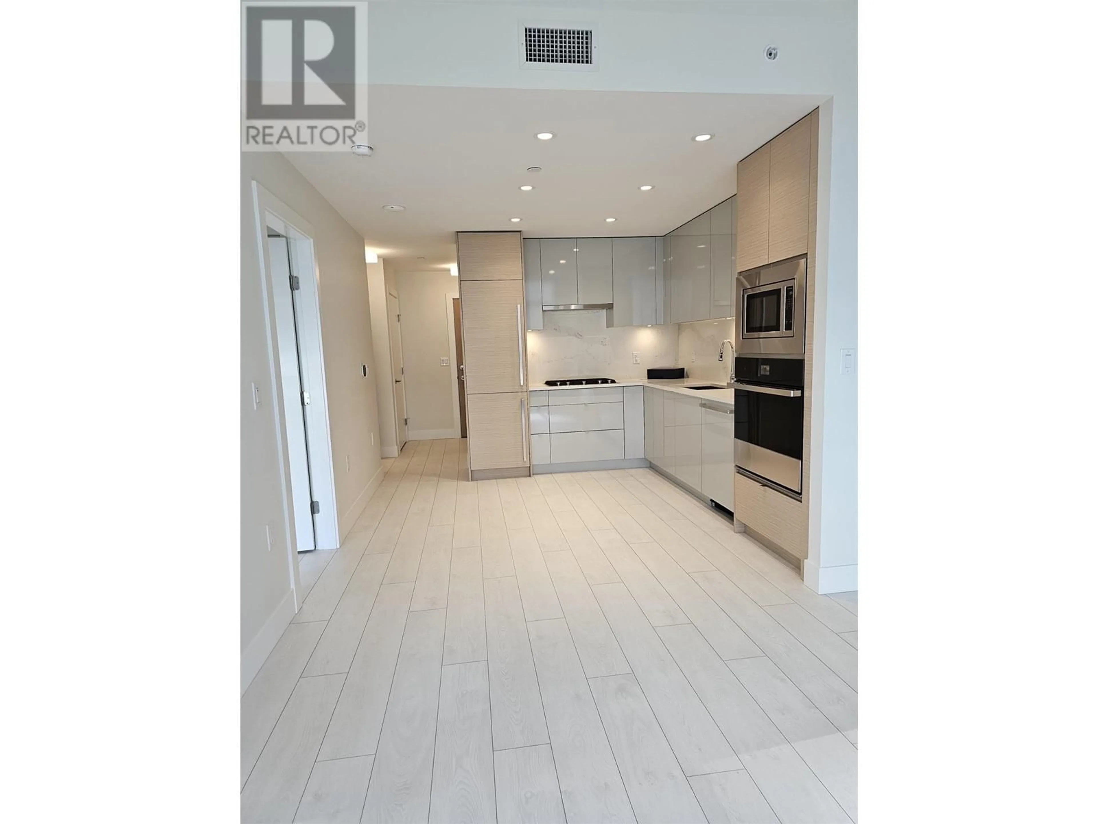 Open concept kitchen, unknown for 616 3438 SAWMILL CRESCENT, Vancouver British Columbia V5S0E3