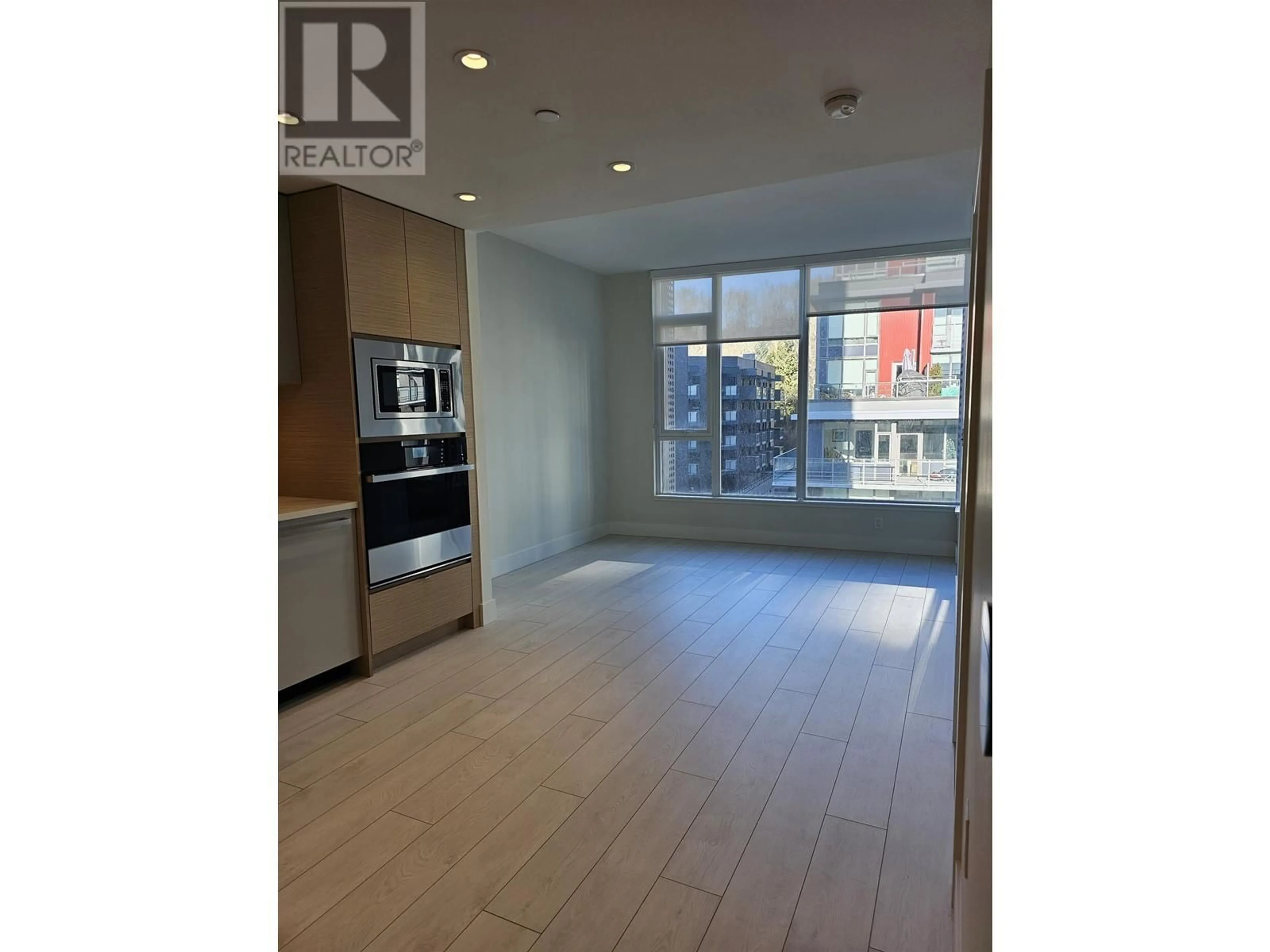 Open concept kitchen, unknown for 616 3438 SAWMILL CRESCENT, Vancouver British Columbia V5S0E3