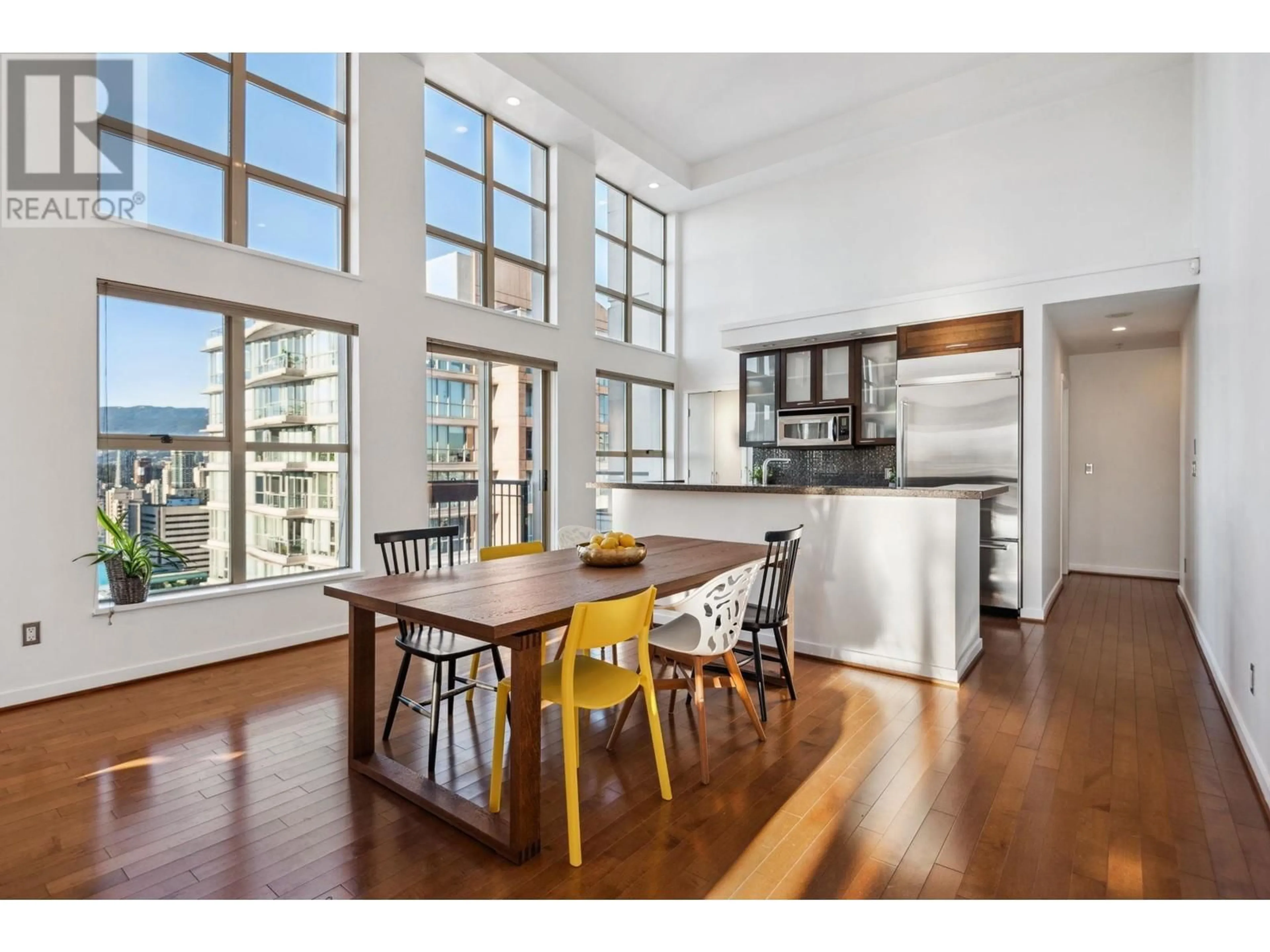 Open concept kitchen, wood/laminate floor for PH1 969 RICHARDS STREET, Vancouver British Columbia V6B1A8