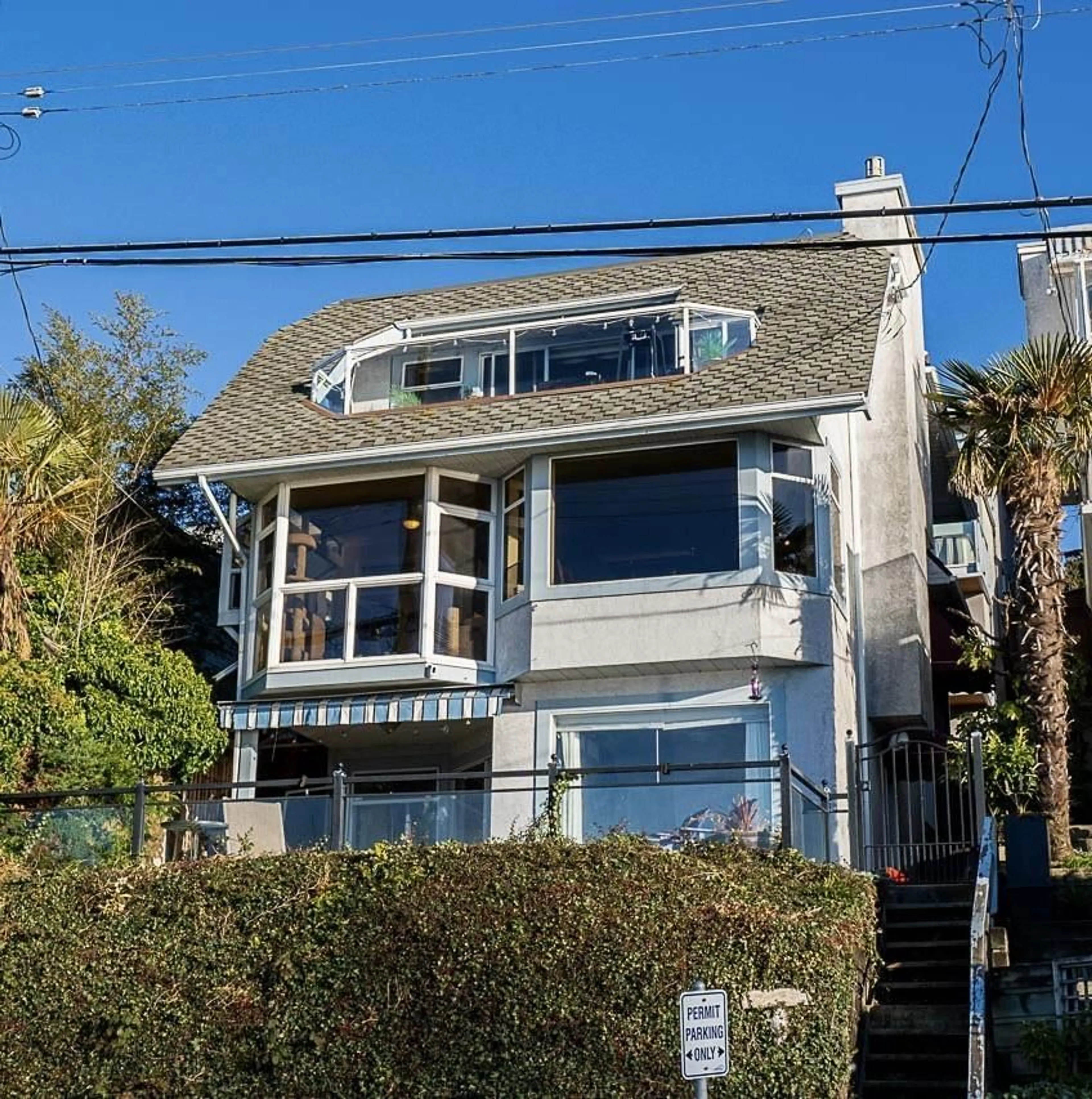 Home with vinyl exterior material, street for 15233 MARINE, White Rock British Columbia V4B1C7