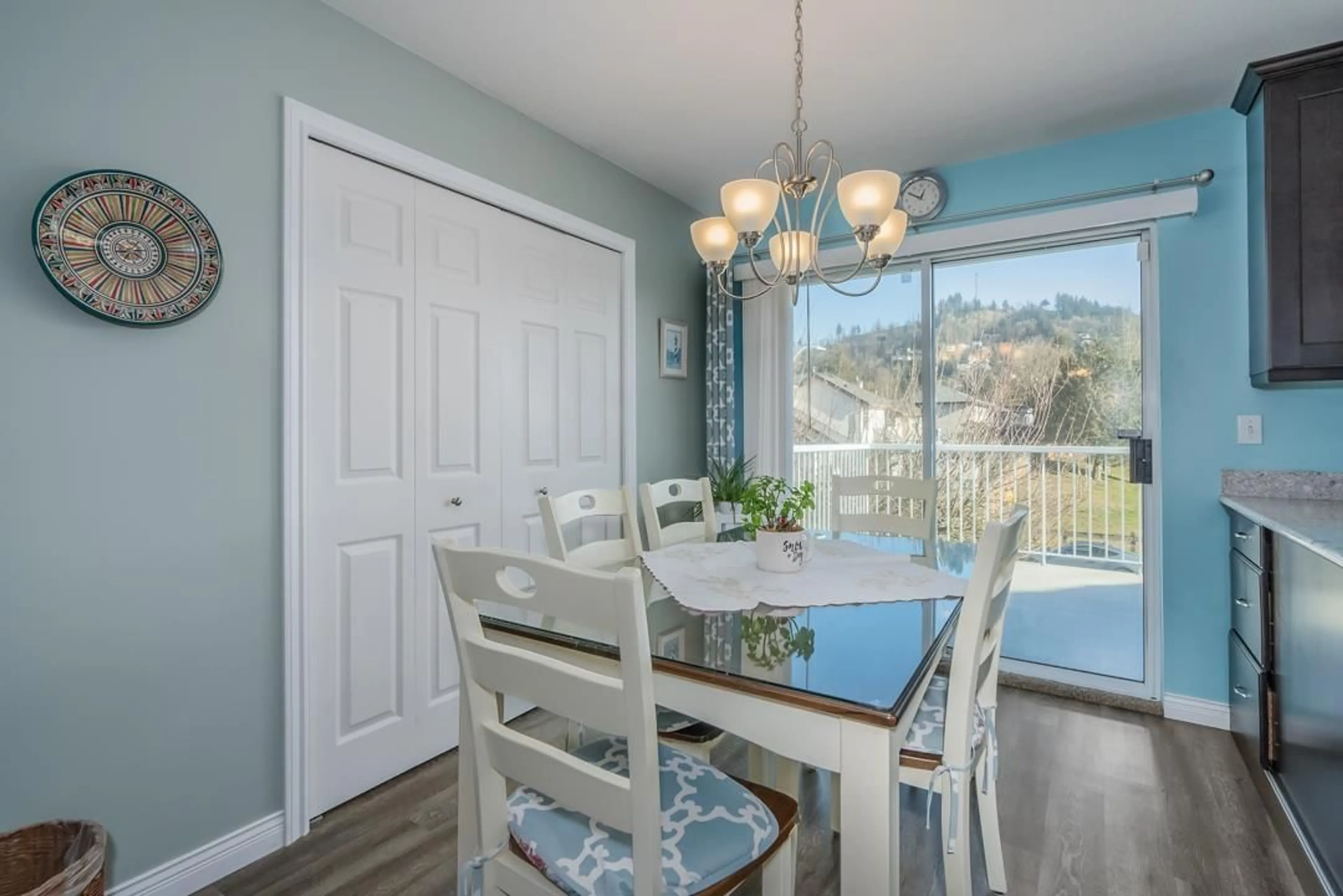 Dining room, wood/laminate floor for 2649 MCADAM, Abbotsford British Columbia V2S7J4