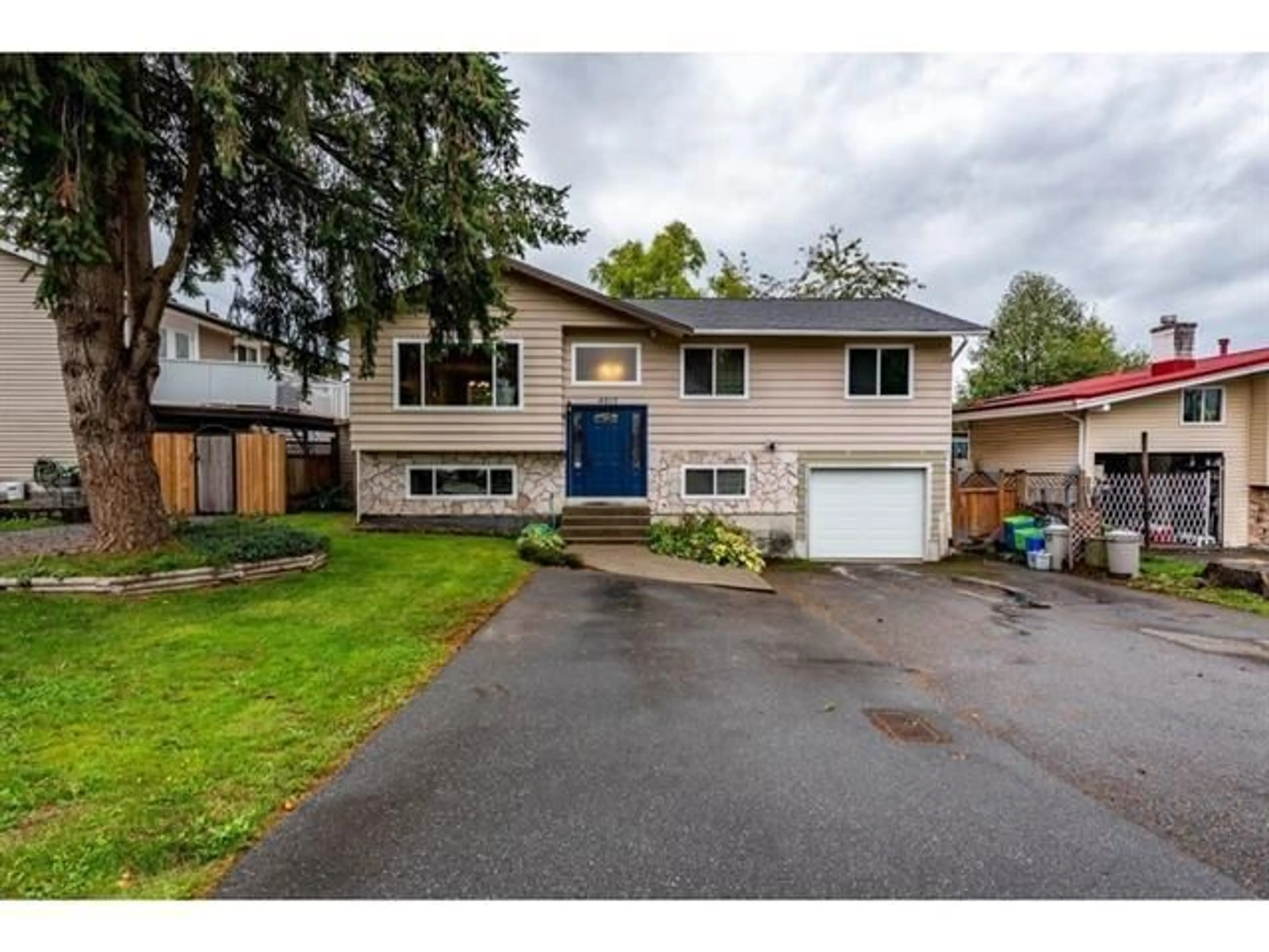 Home with vinyl exterior material, street for 4815 201 STREET, Langley British Columbia V3A5V6