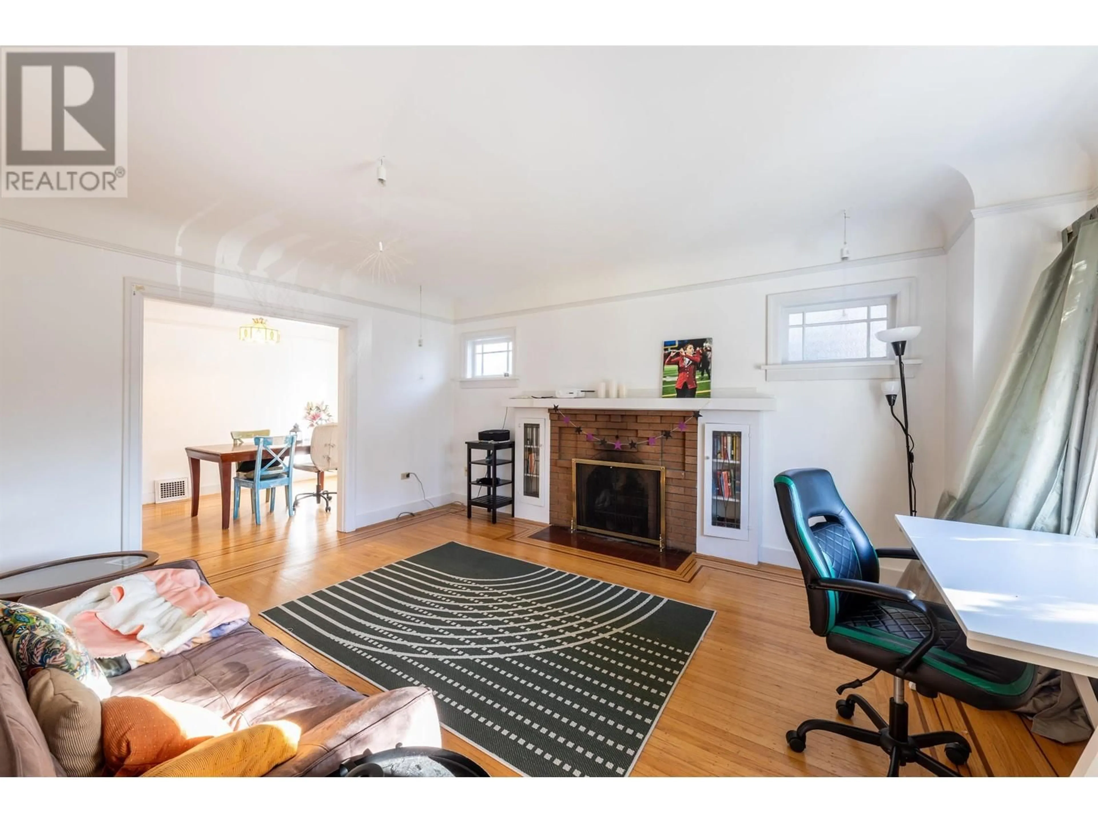 Living room with furniture, wood/laminate floor for 3889 W 18TH AVENUE, Vancouver British Columbia V6S1B4