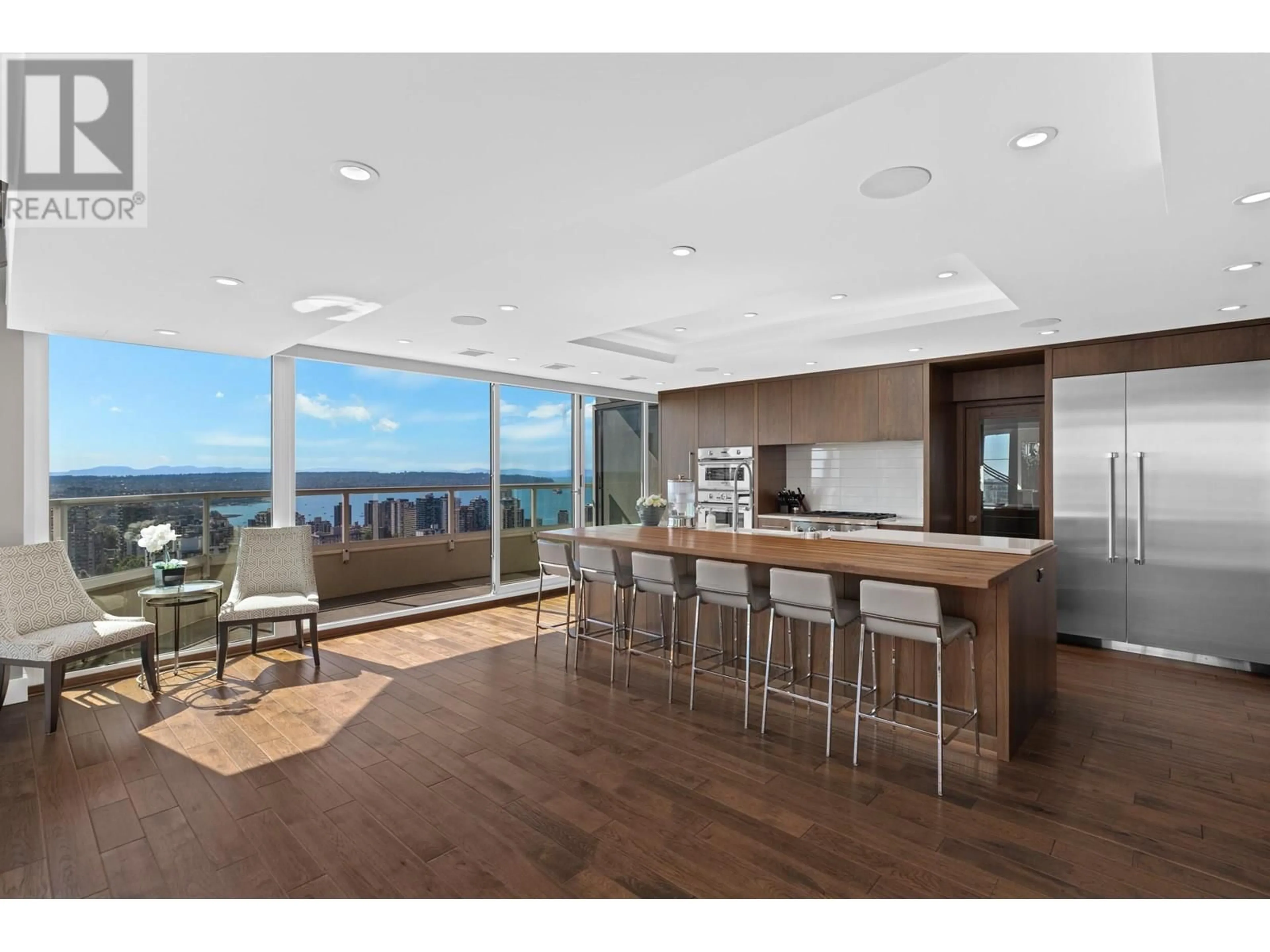 Open concept kitchen, wood/laminate floor for 3101 - 717 JERVIS STREET, Vancouver British Columbia V6E4L5