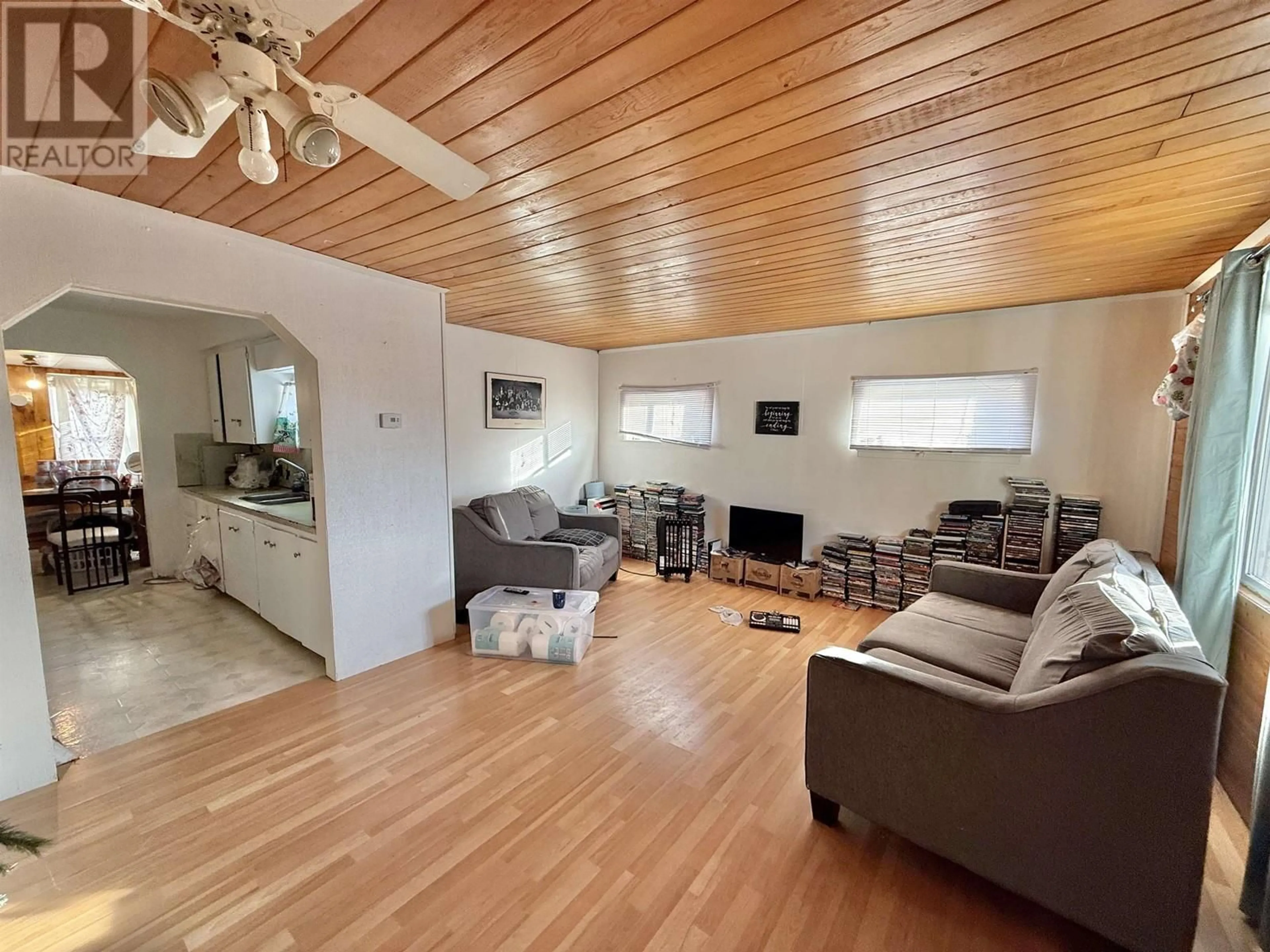 Living room with furniture, wood/laminate floor for 767 AVISON AVENUE, Quesnel British Columbia V2J1G7