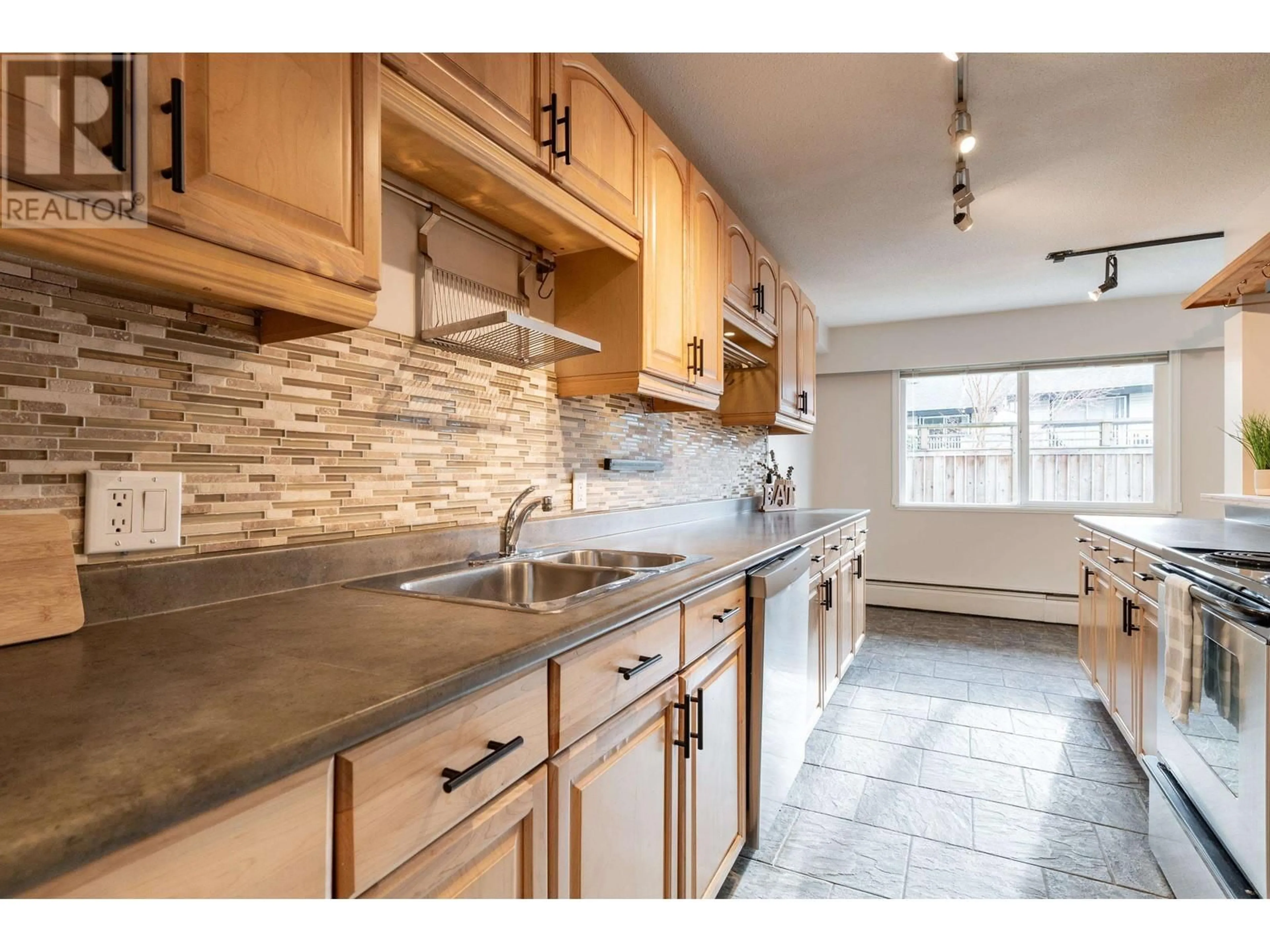 Standard kitchen, ceramic/tile floor for 59 928 PREMIER STREET, North Vancouver British Columbia V7J2H1