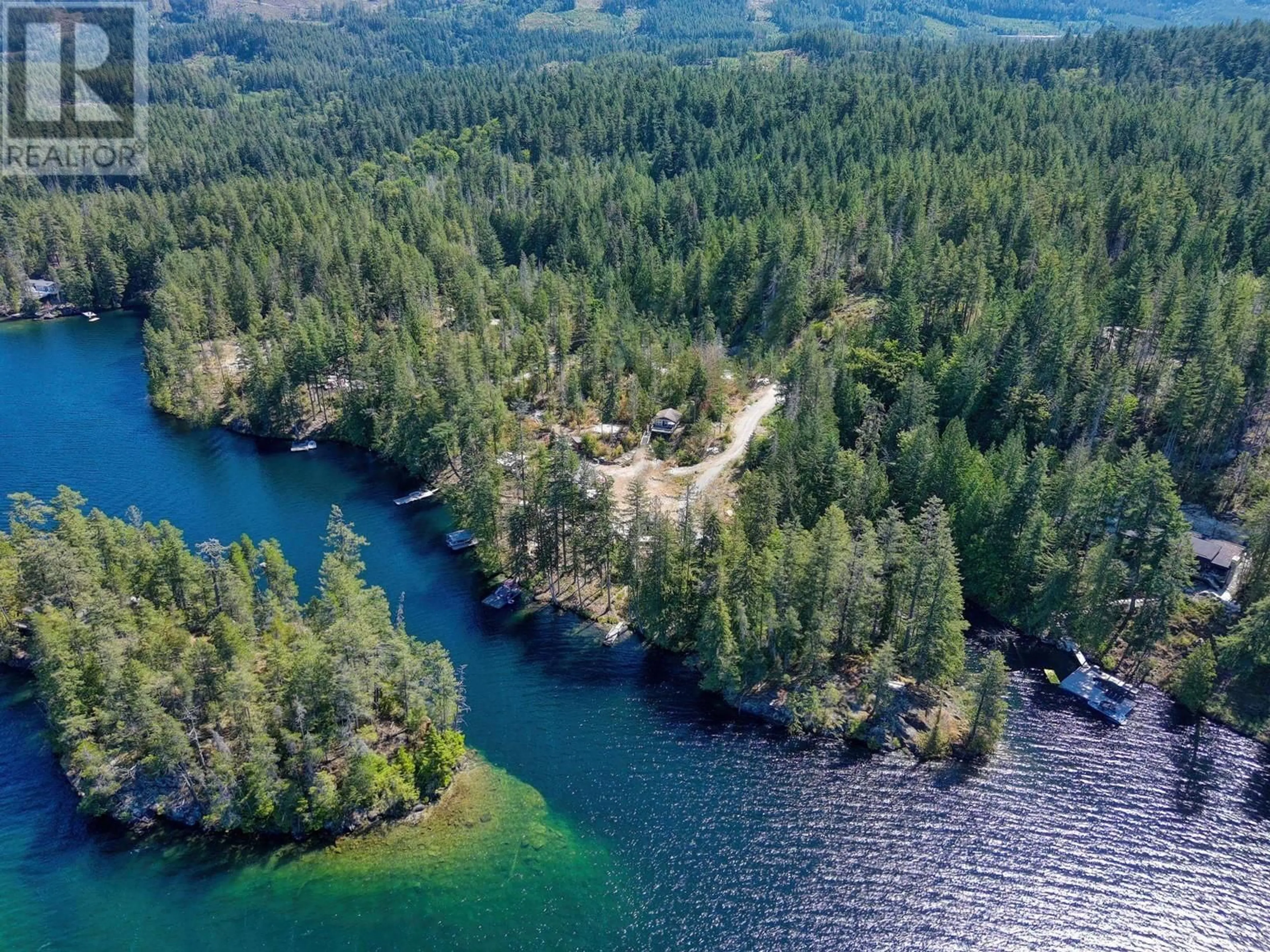 A pic from outside/outdoor area/front of a property/back of a property/a pic from drone, water/lake/river/ocean view for 8625 SAKINAW CREEK ROAD, Pender Harbour British Columbia V0N2H0