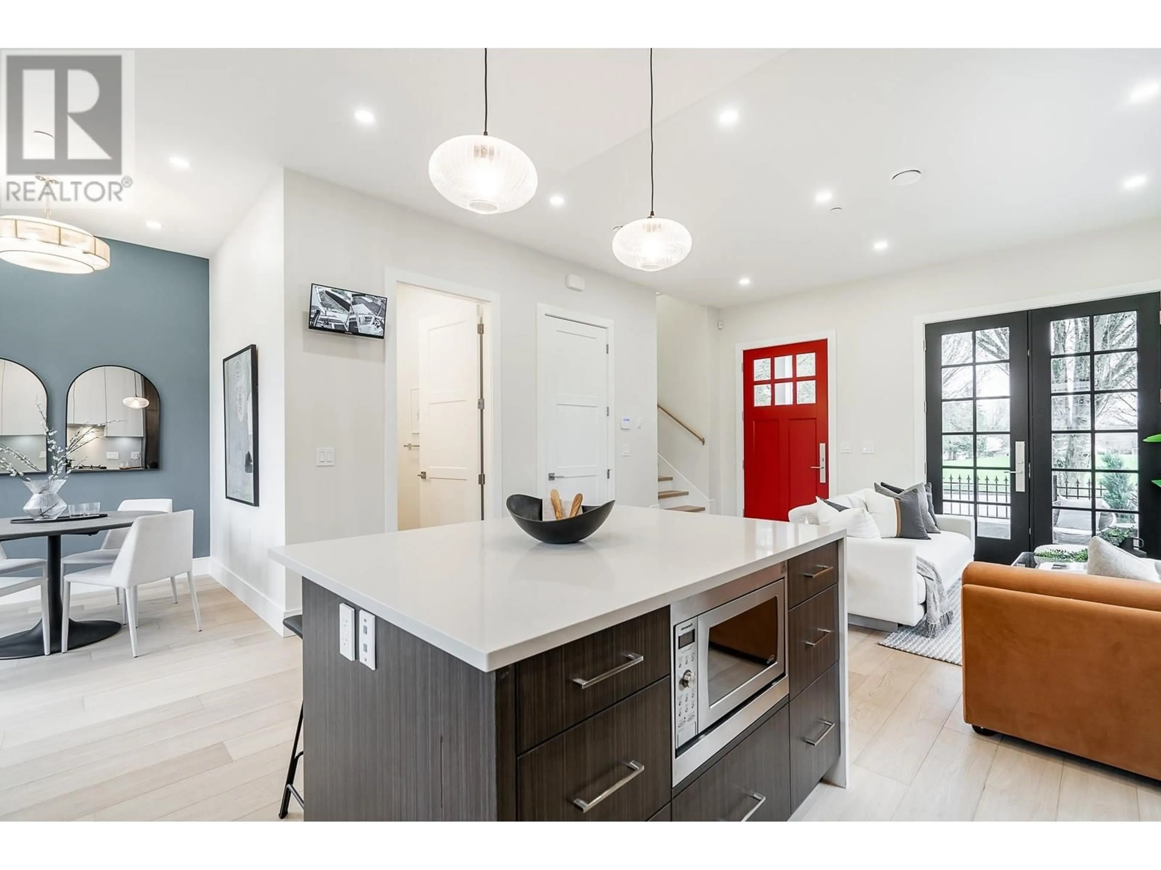 Open concept kitchen, ceramic/tile floor for 1 3220 SLOCAN STREET, Vancouver British Columbia V5M3E3