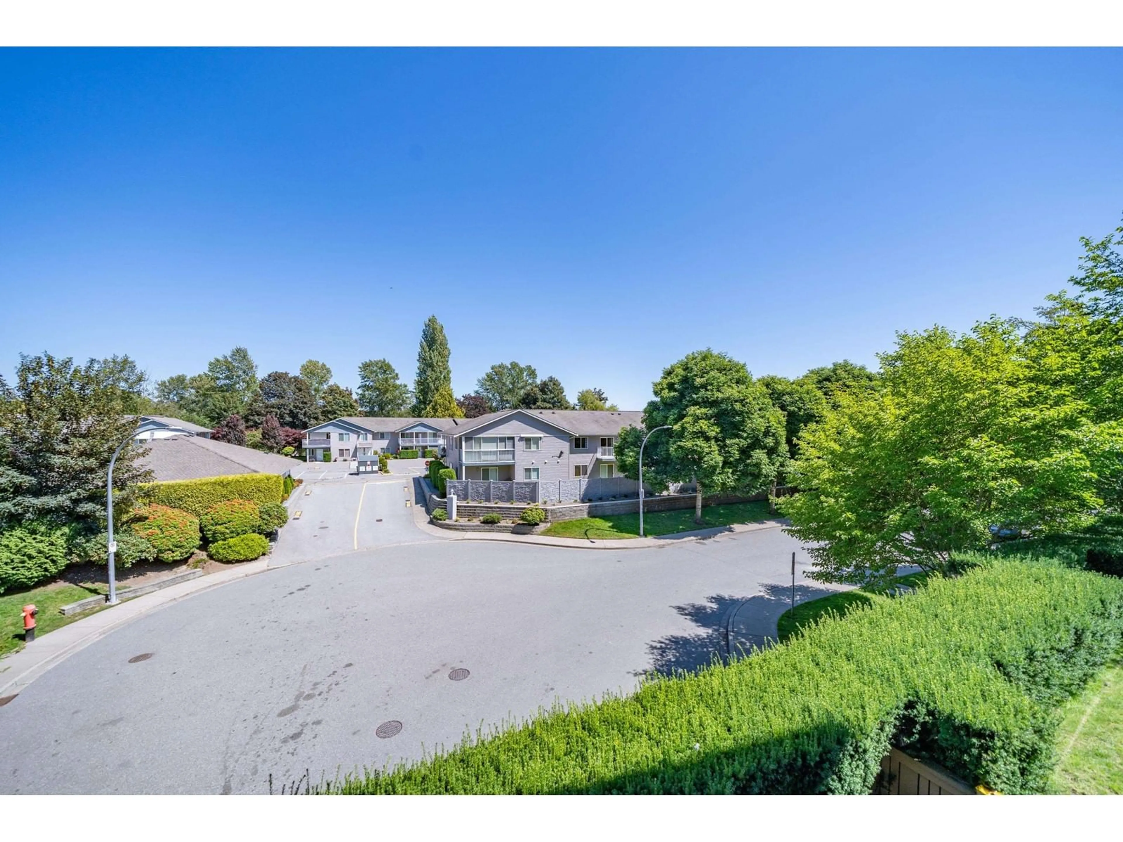 A pic from outside/outdoor area/front of a property/back of a property/a pic from drone, mountain view for 202 5655 210A STREET, Langley British Columbia V3A0G4