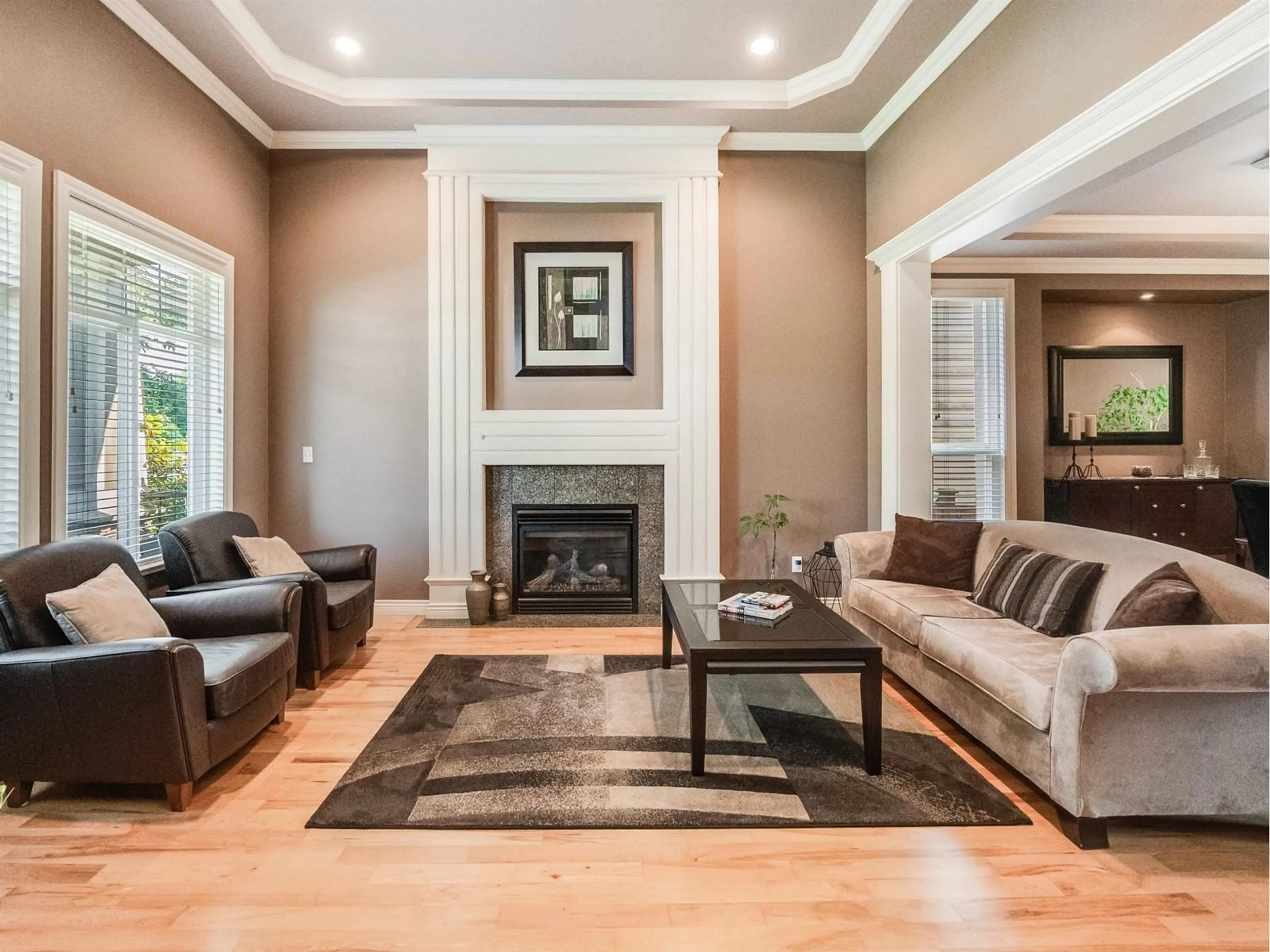 Living room with furniture, wood/laminate floor for 16096 110A AVENUE, Surrey British Columbia V4N4Y1